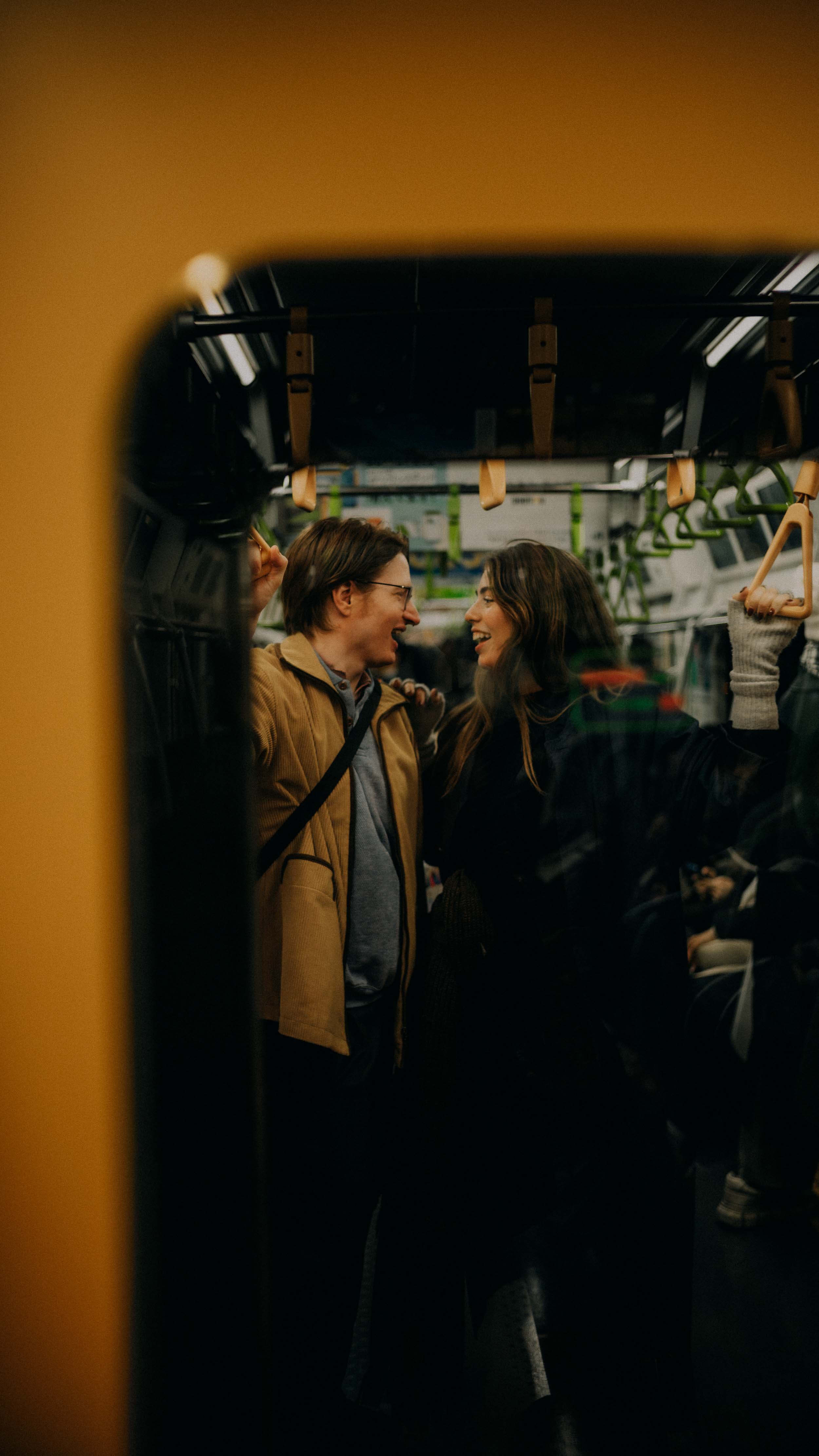 1-tokyo-train-window-laughter-portrait-leica-m11.jpg