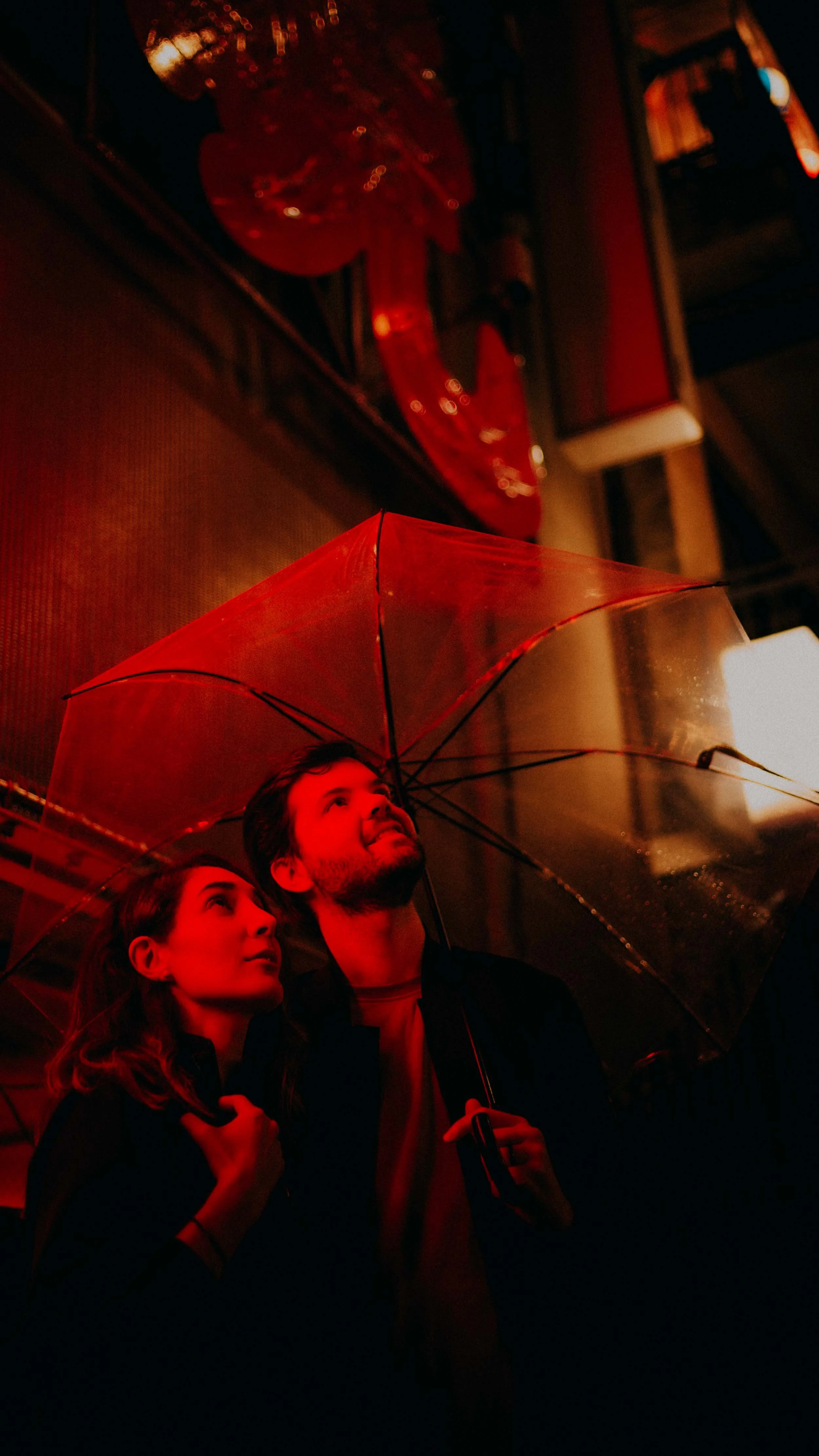 12-tokyo-couple-neon-upward-glow-portrait-leica-m11.jpg