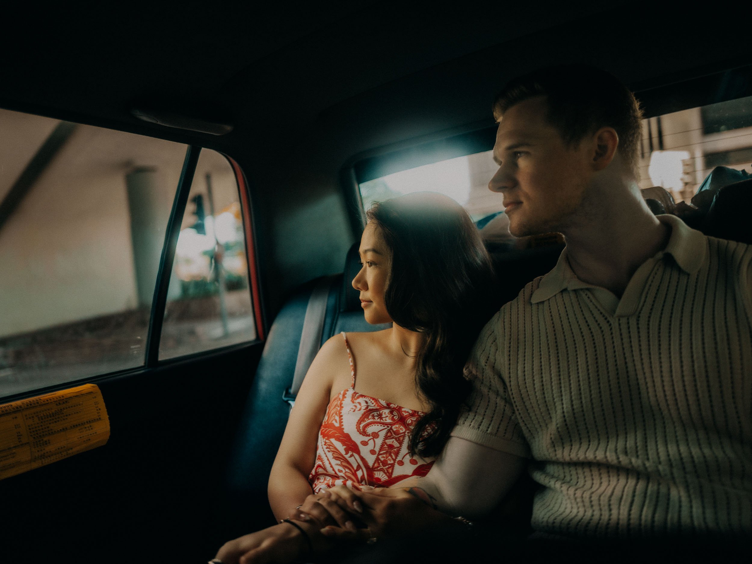 30-hongkong-taxi-ride-wanchai-to-kowloon-engagement-session-landscape-leica-q3.jpg