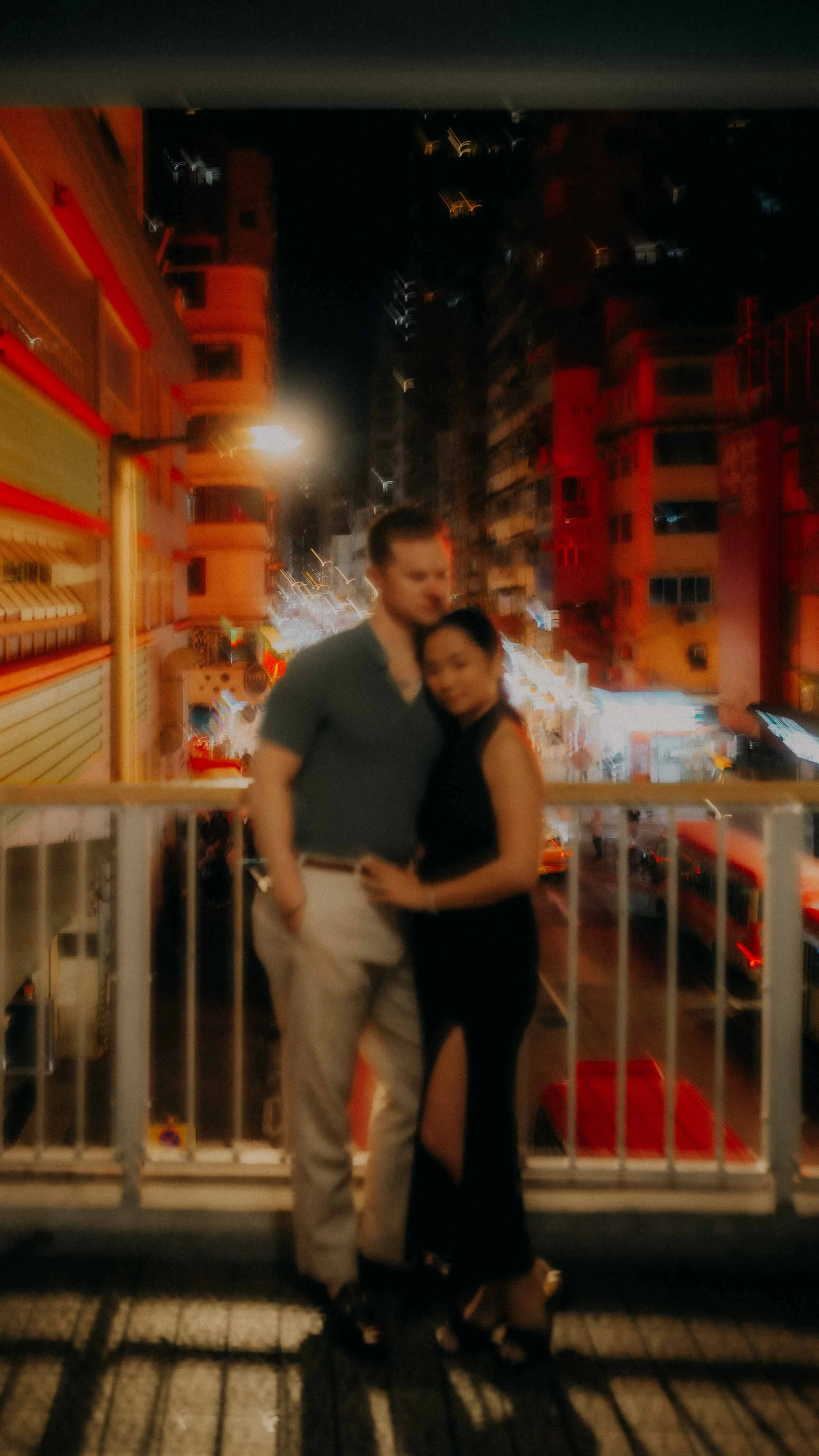 21-hong-kong-engagement-session-night-neon-pedestrian-walkway-portrait-leica-q3.jpg