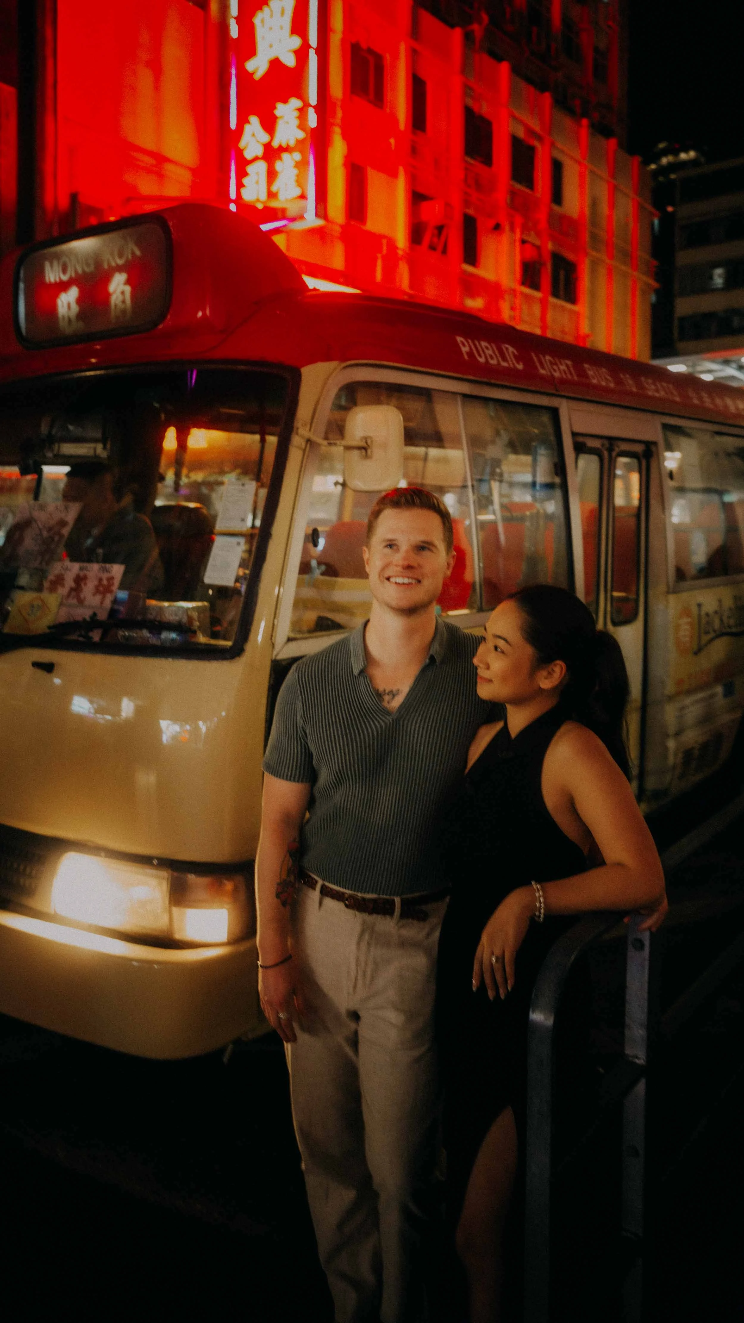 23-hong-kong-engagement-session-night-candid-mong-kok-light-bus-portrait-leica-q3.jpg