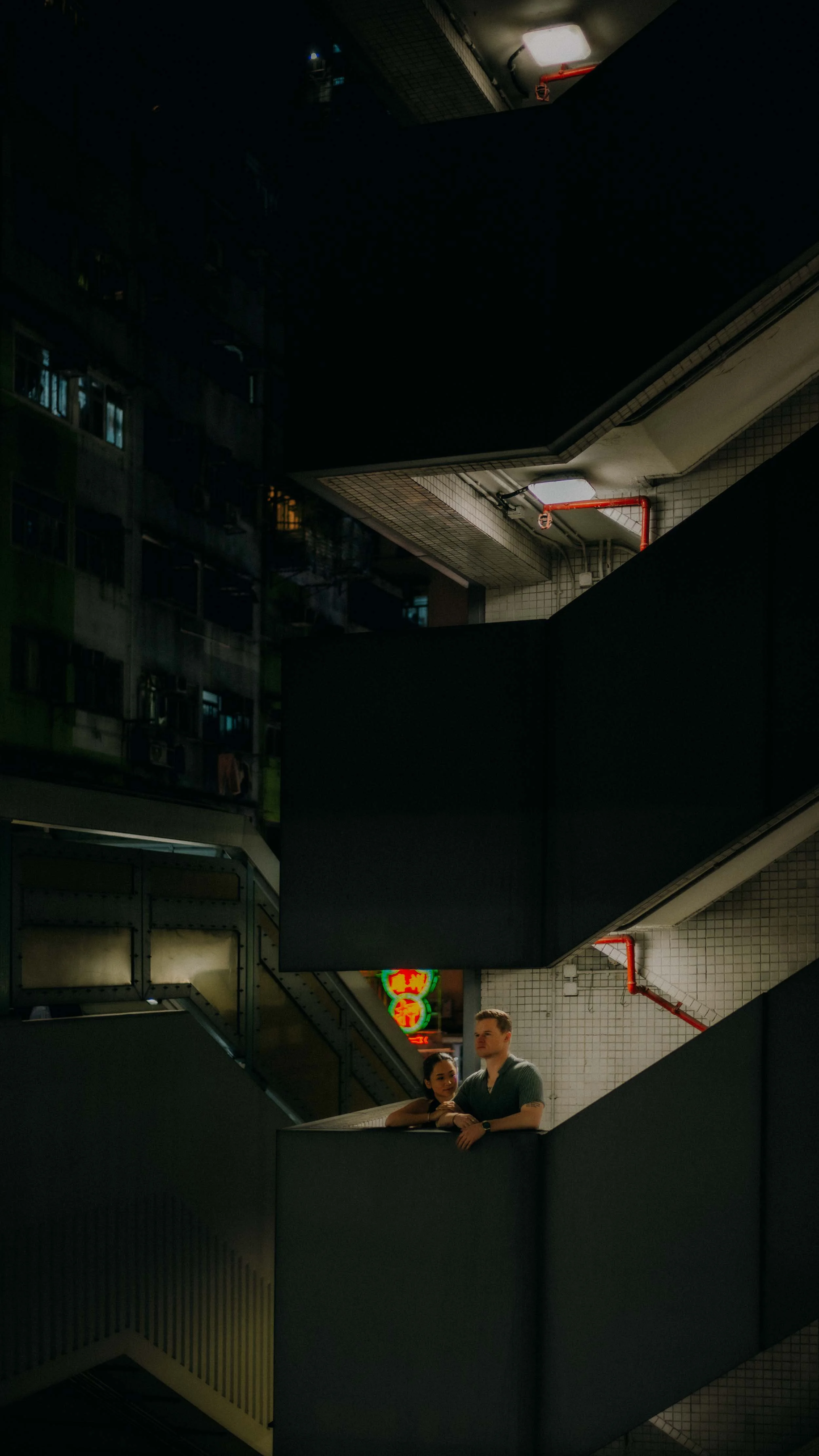 28-hongkong-engagement-session-night-stairwell-neon-portrait-leica-sl2.jpg