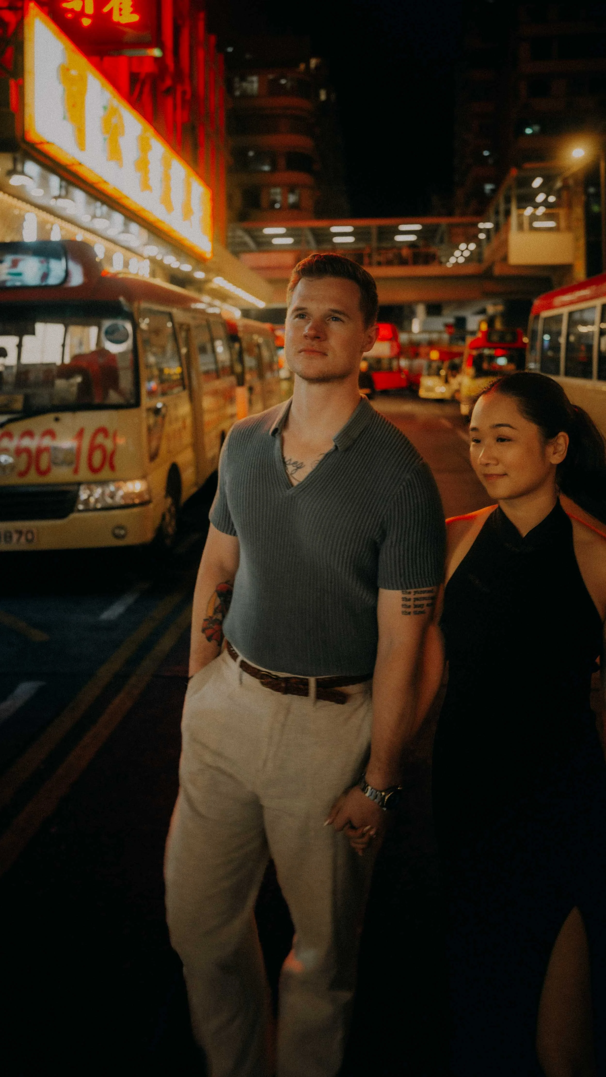 35-hong-kong-engagement-session-queued-light-buses-mong-kok-night-portrait-leica-q3.jpg