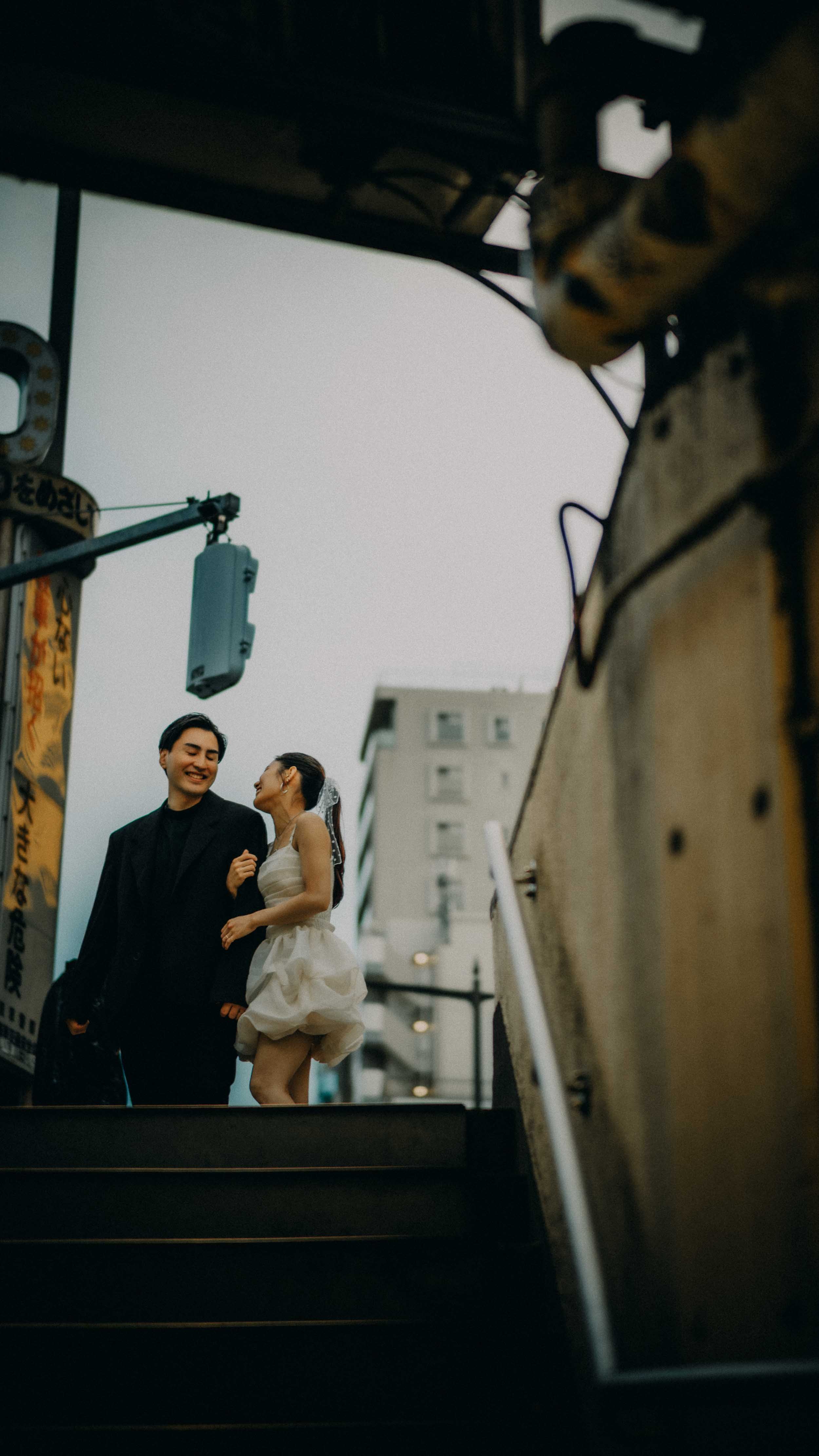 7-tokyo-engagement-asakusa-underground-stairwell-laughter-leicam11.jpg