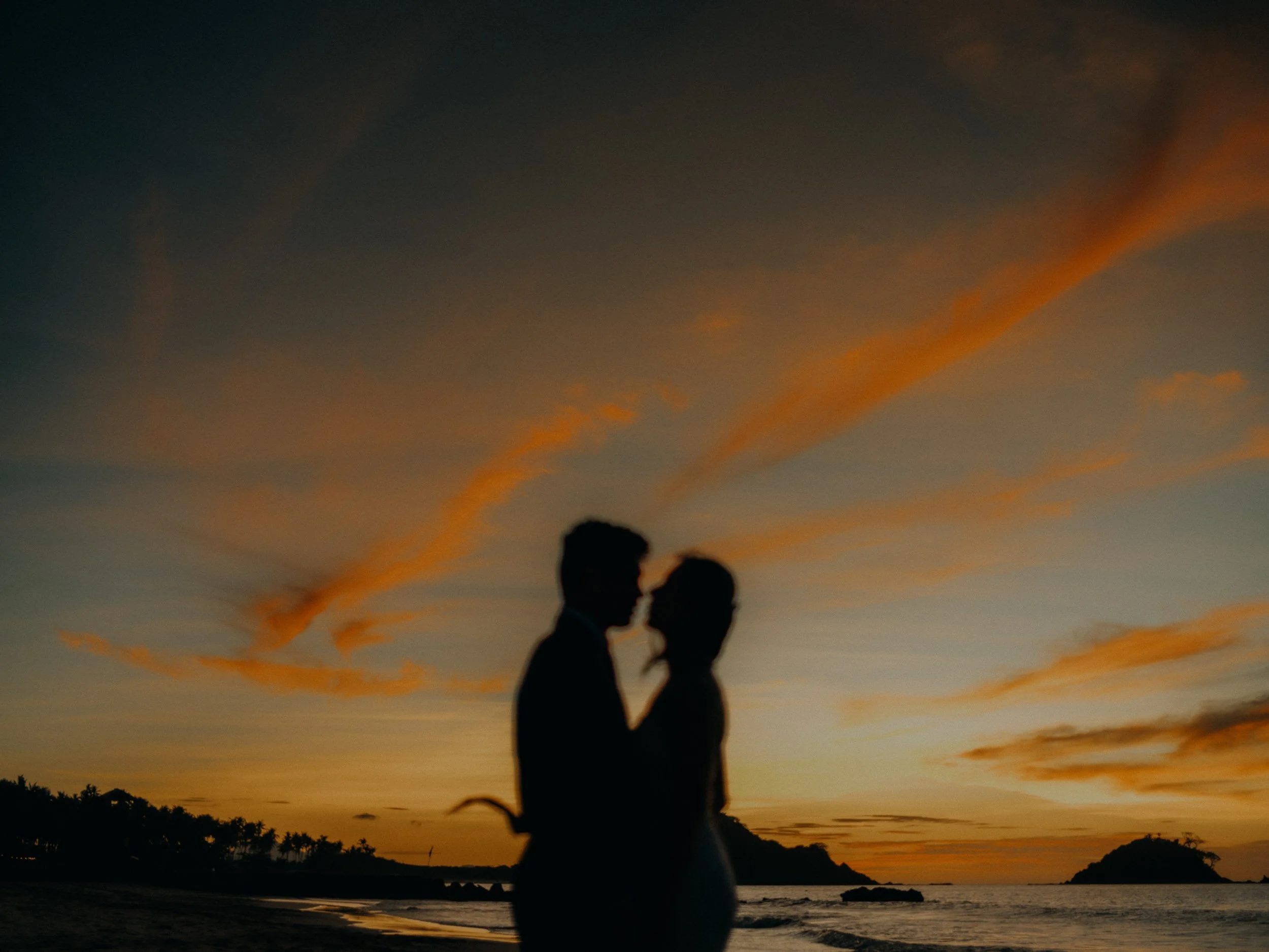 31-elnido-elopement-nacpanbeach-sunset-silhouette-sonya7rv.jpg