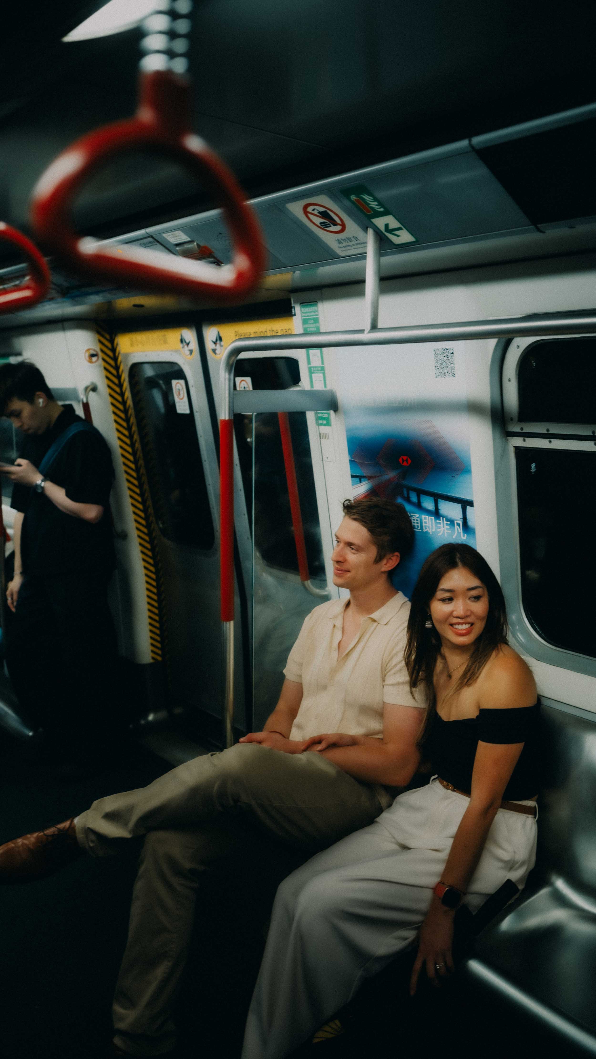 14-hongkong-coupleshoot-mtr-seated-chill-leicaq3.jpg