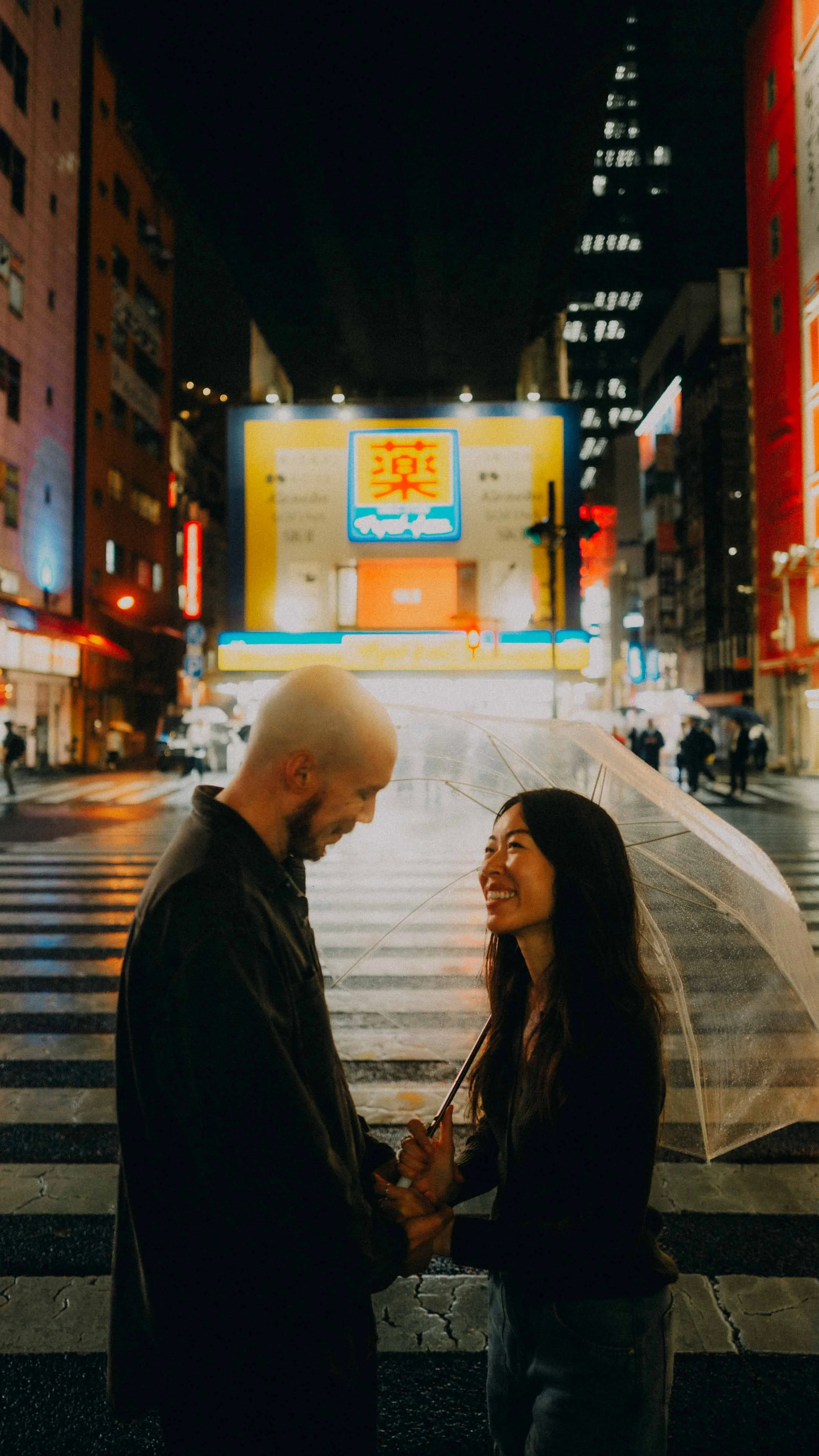 6-tokyo-honeymoon-akihabara-crosswalk-umbrella-leicaq3.jpg