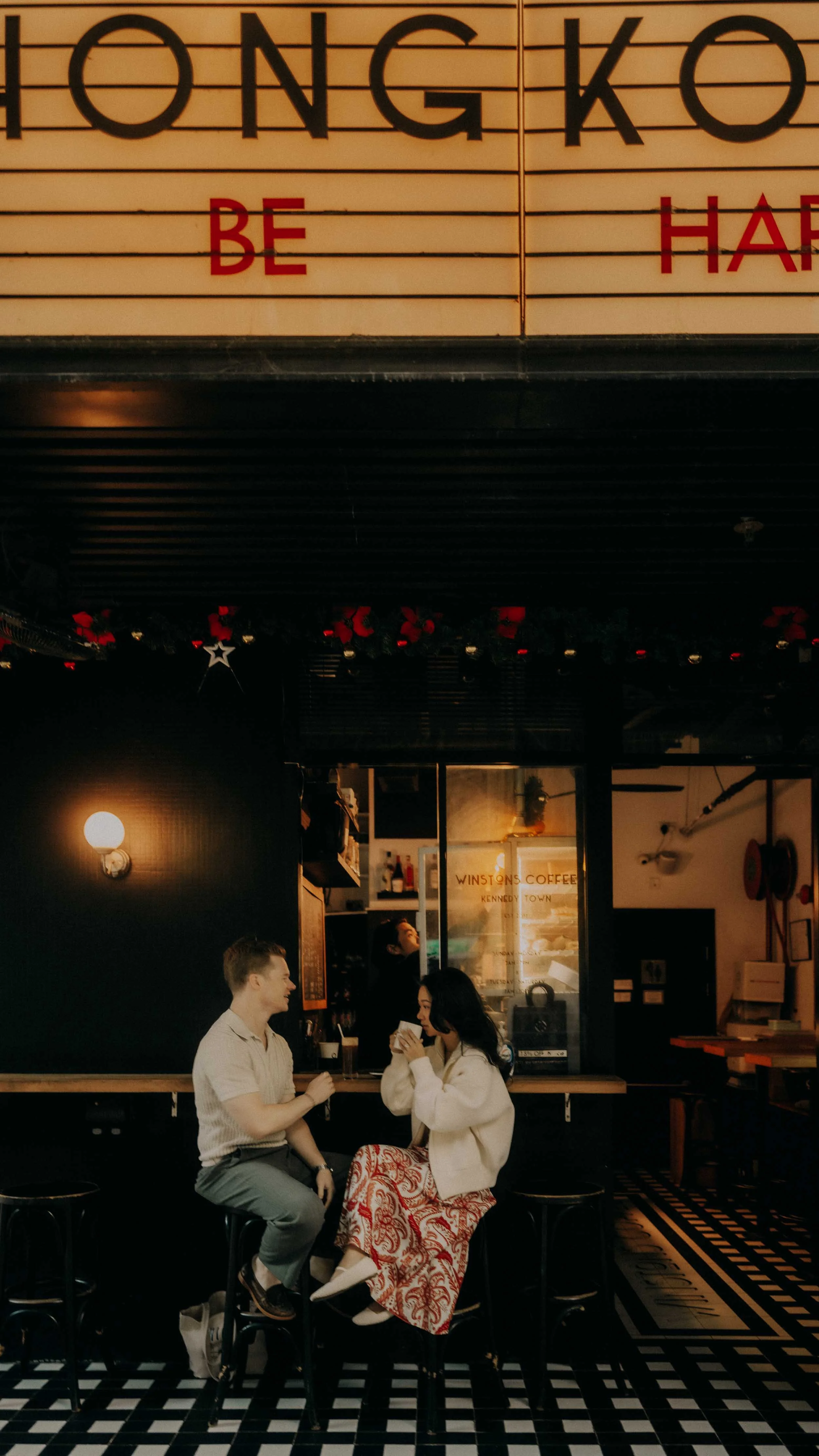 22-hongkong-engagement-kennedytown-cafe-seated-leicaq3.jpg
