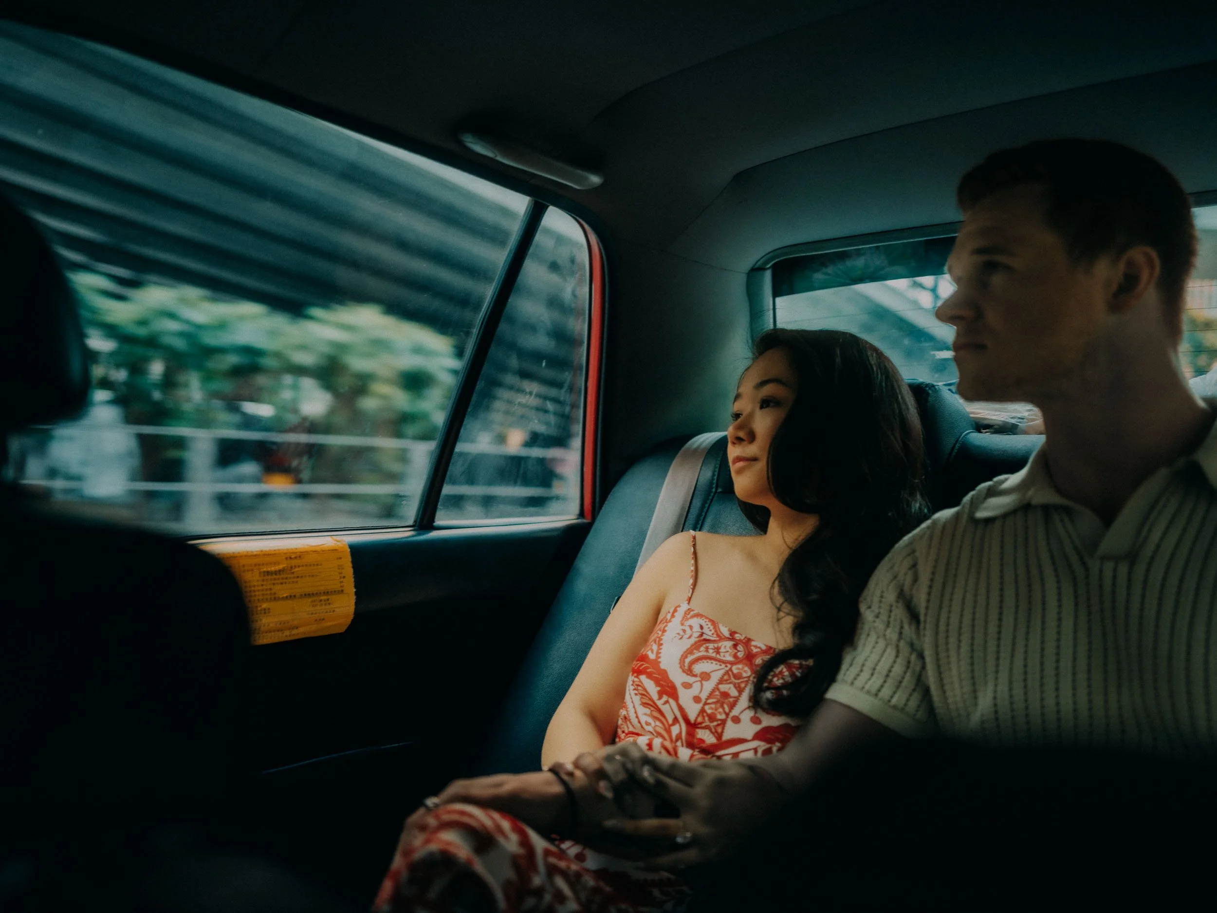 32-hongkong-engagement-hongkong-taxi-windowview-leicaq3.jpg