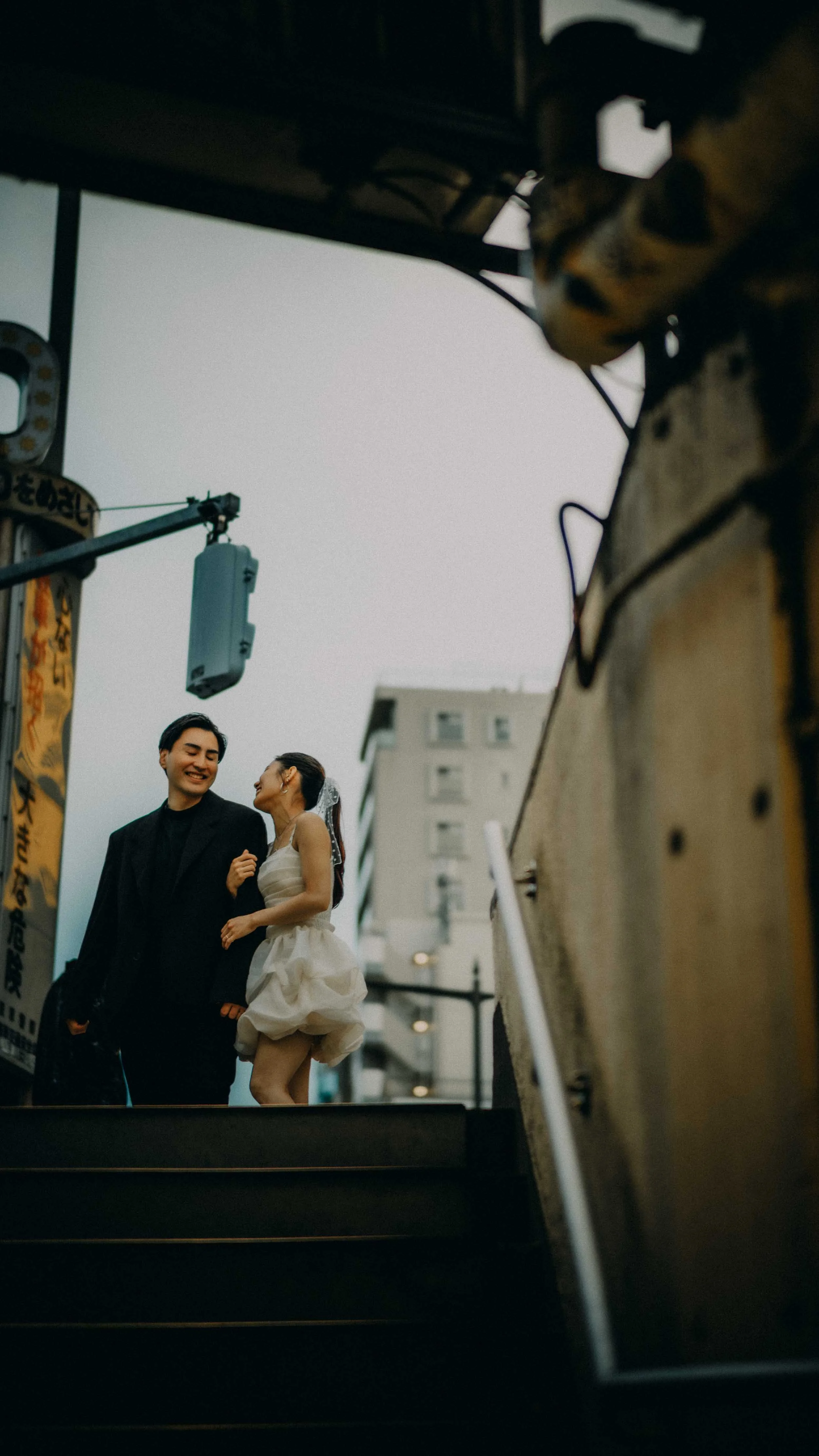 8-tokyo-engagement-asakusa-underground-stairwell-laughter-leicam11.jpg