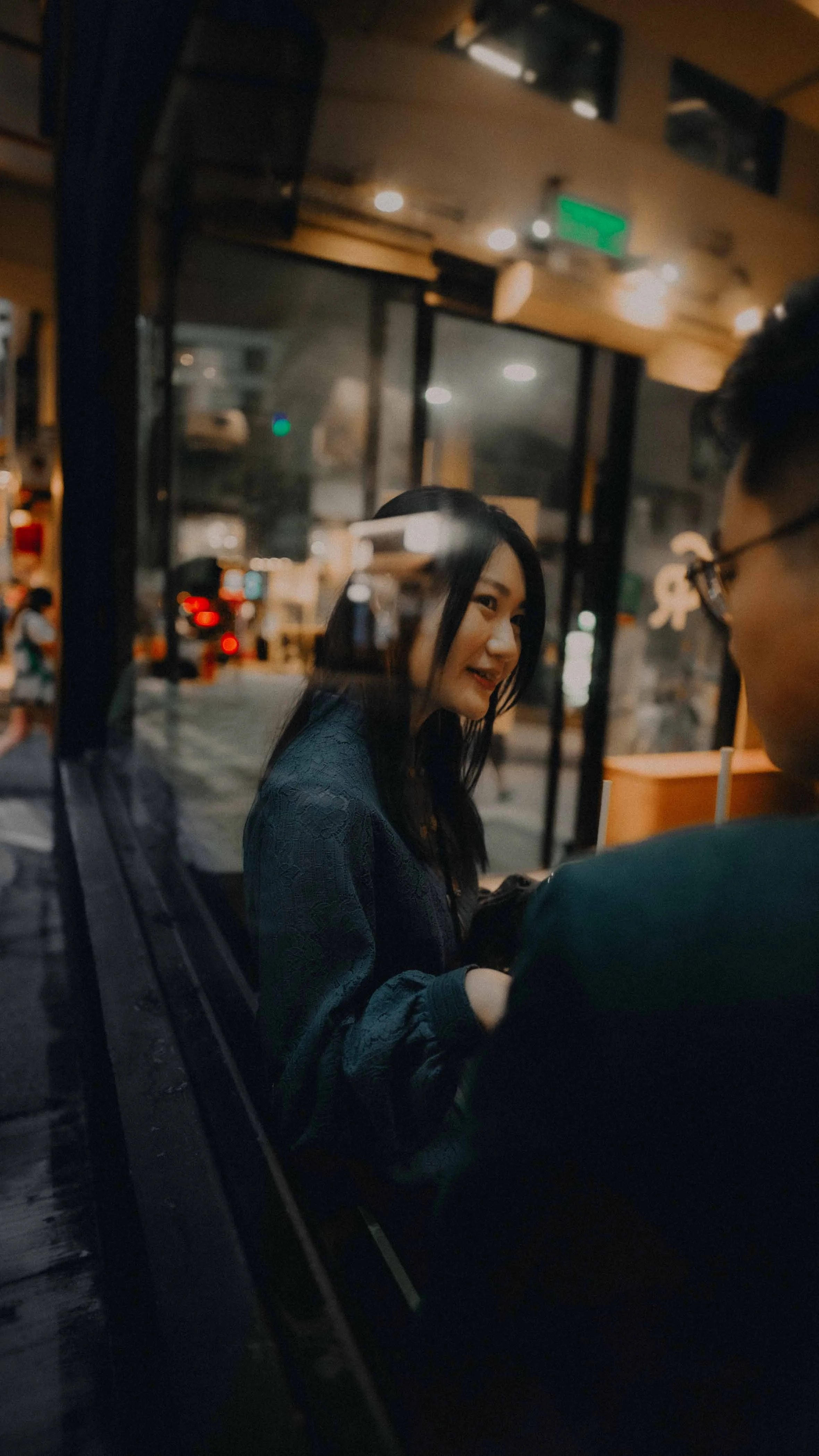 6-hongkong-engagement-central-cuppingroom-windowreflection-sonya7siii.jpg