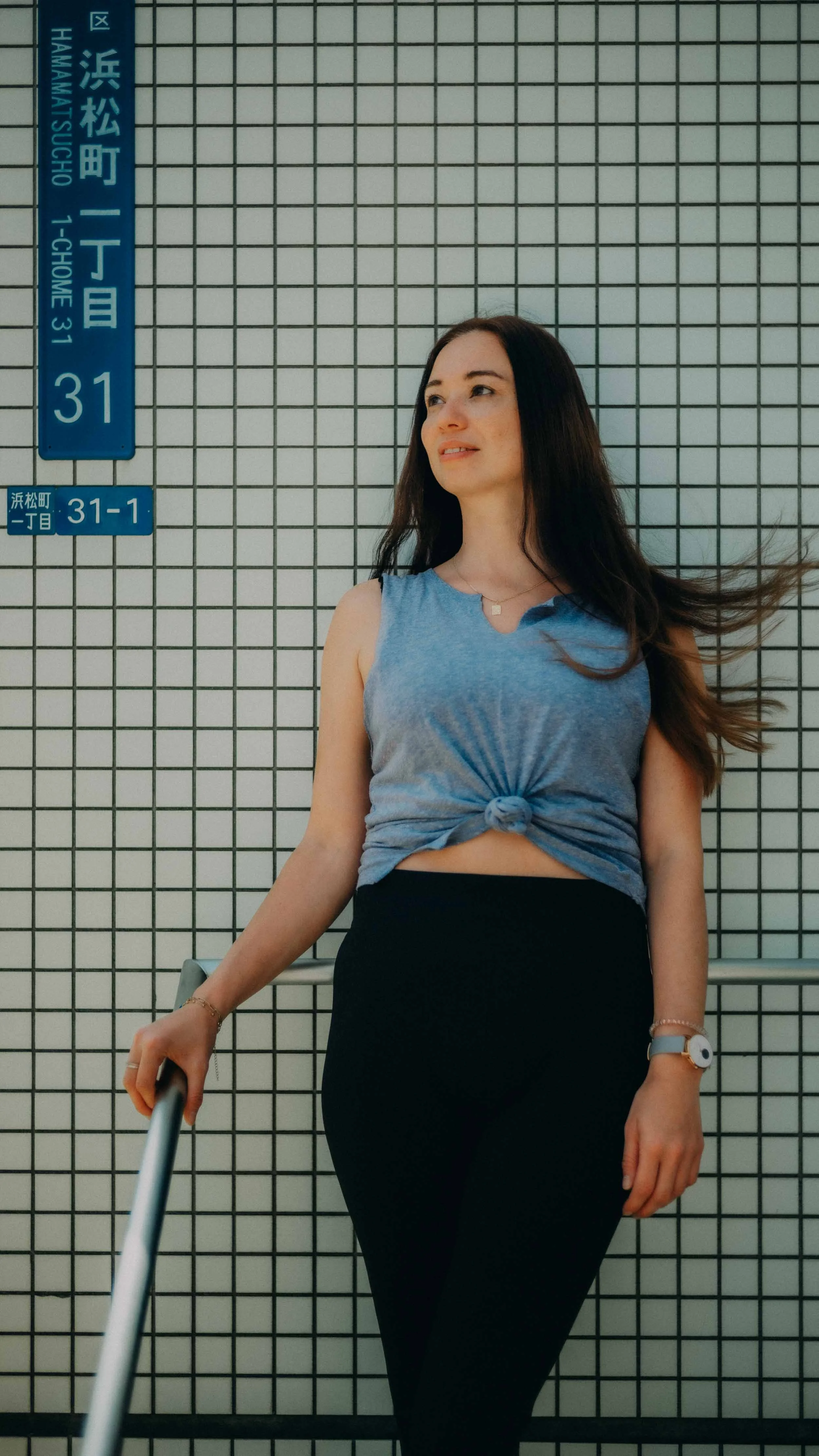 2-tokyo-portrait-hamamatsucho-tiledwall-windblownhair-leicasl2.jpg