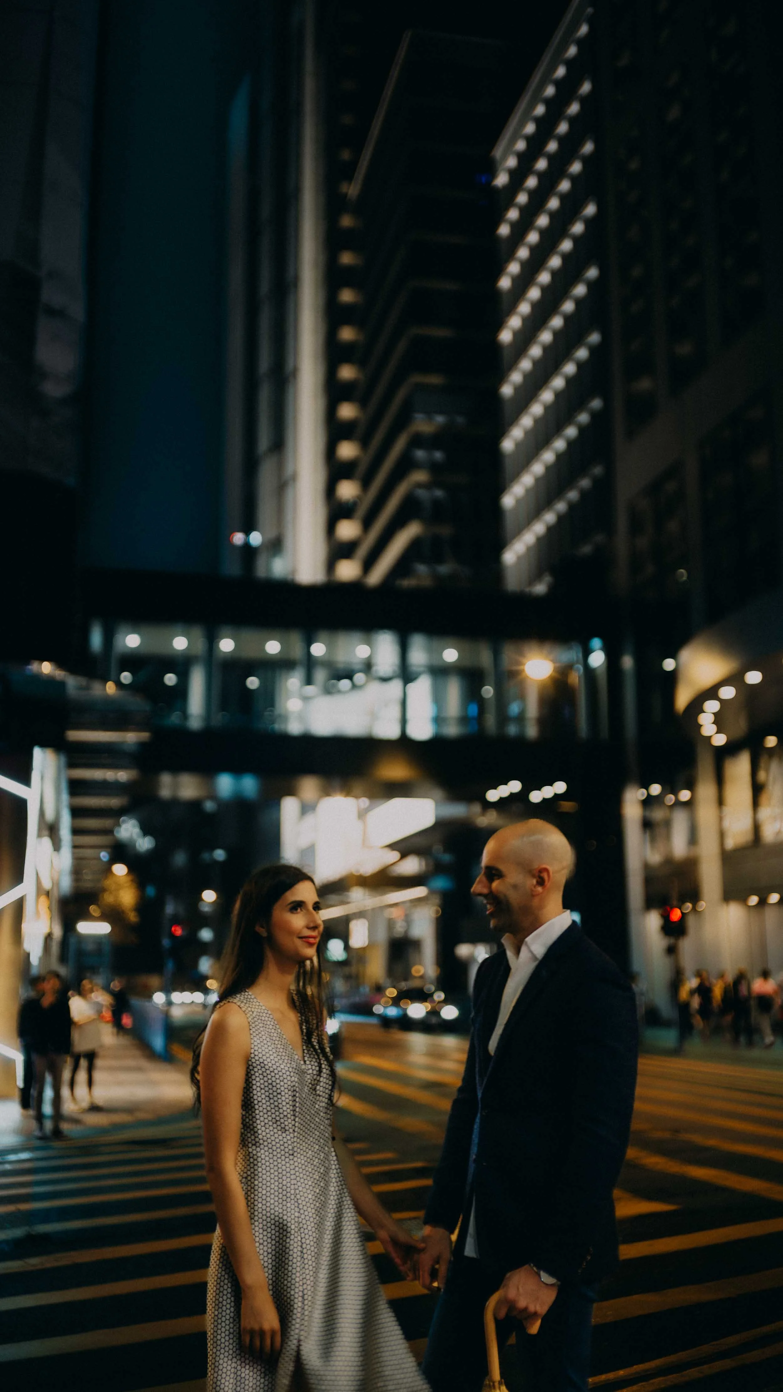 5-hongkong-engagement-central-crosswalk-holdinghands-sonya7iii.jpg