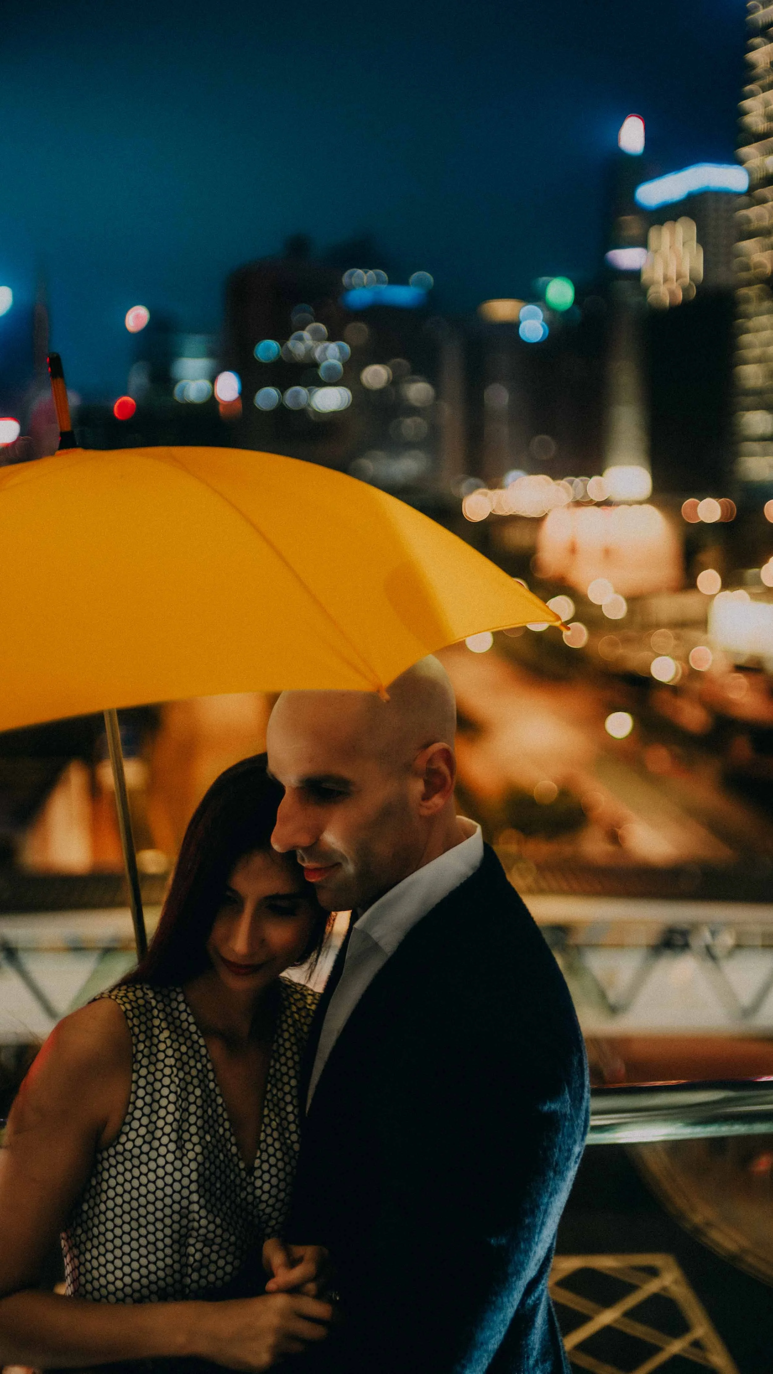 6-hongkong-engagement-central-overlook-yellowumbrella-embrace-sonya7iii.jpg