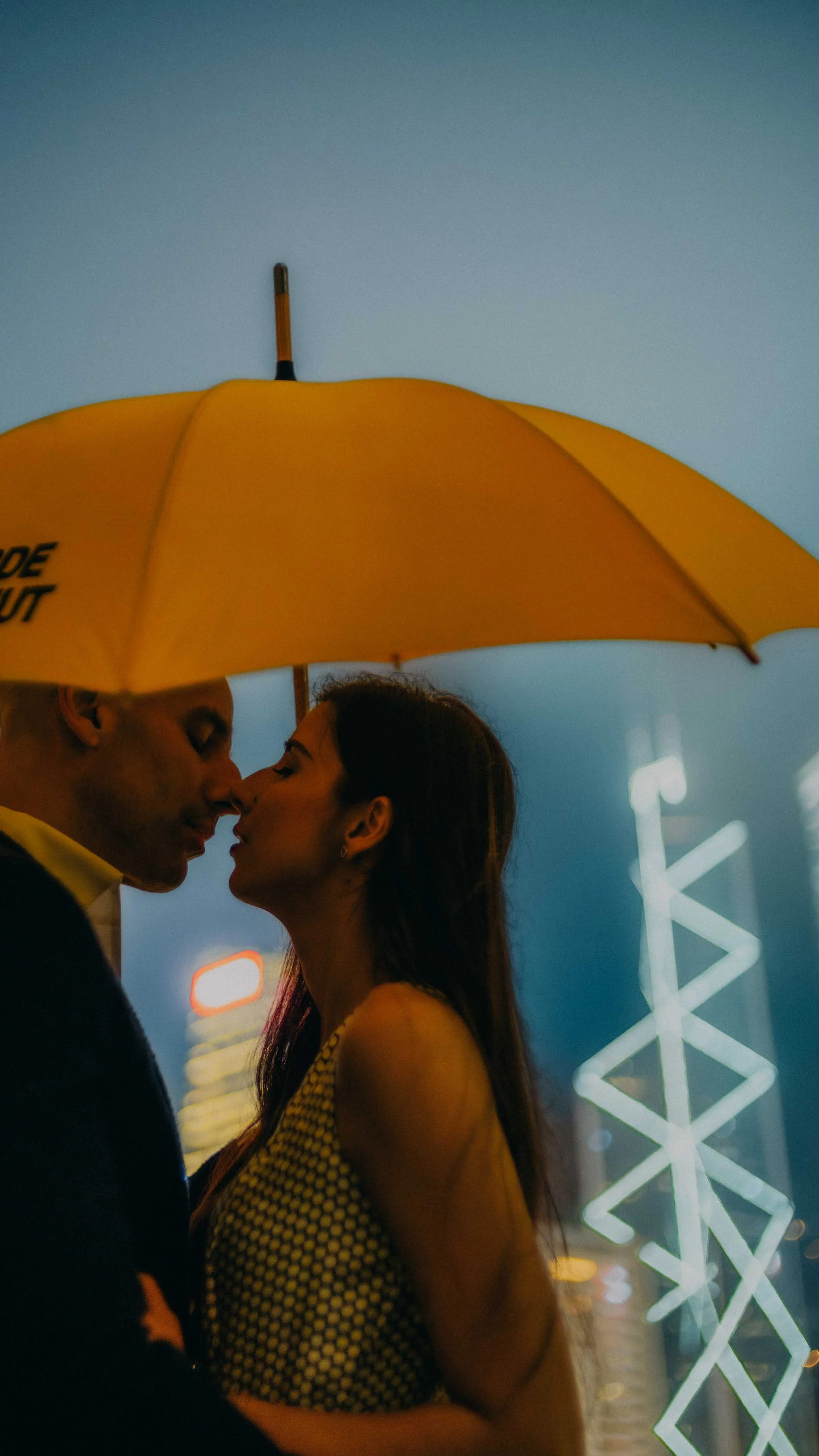 8-hongkong-engagement-central-skyline-umbrella-closeup-sonya7iii.jpg