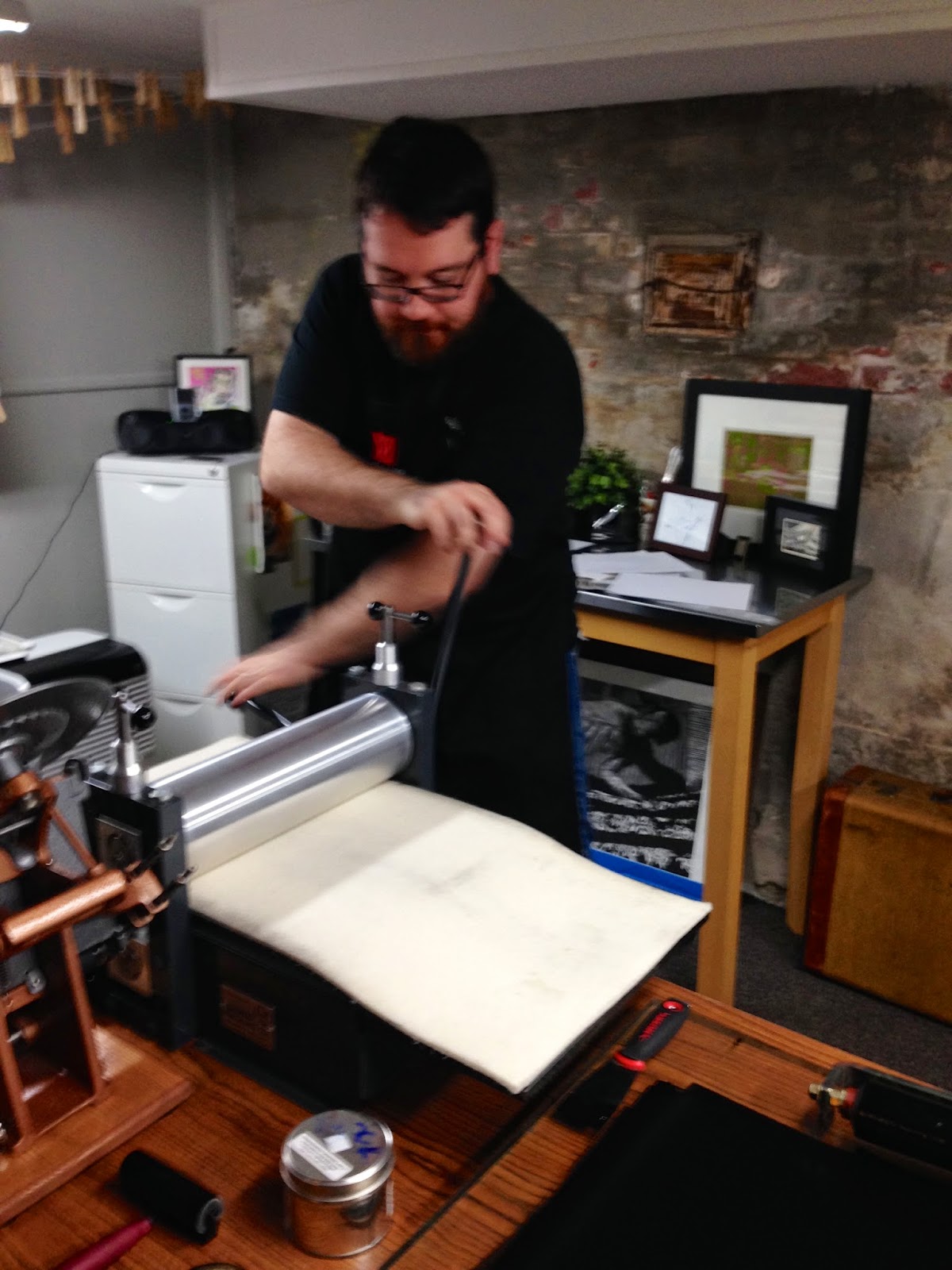 Me operating the etching press. 