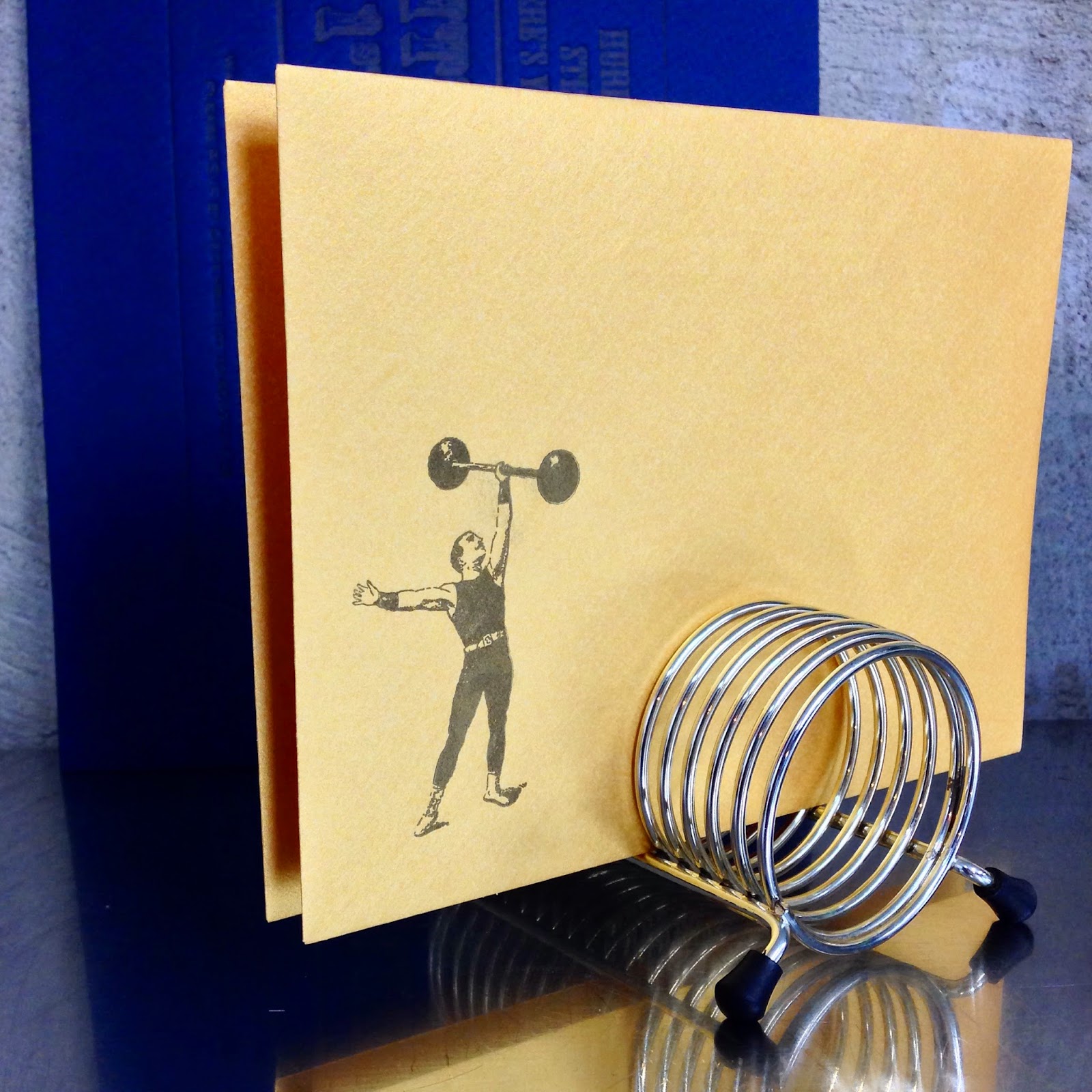 He looks killer on the metallic gold envelopes!