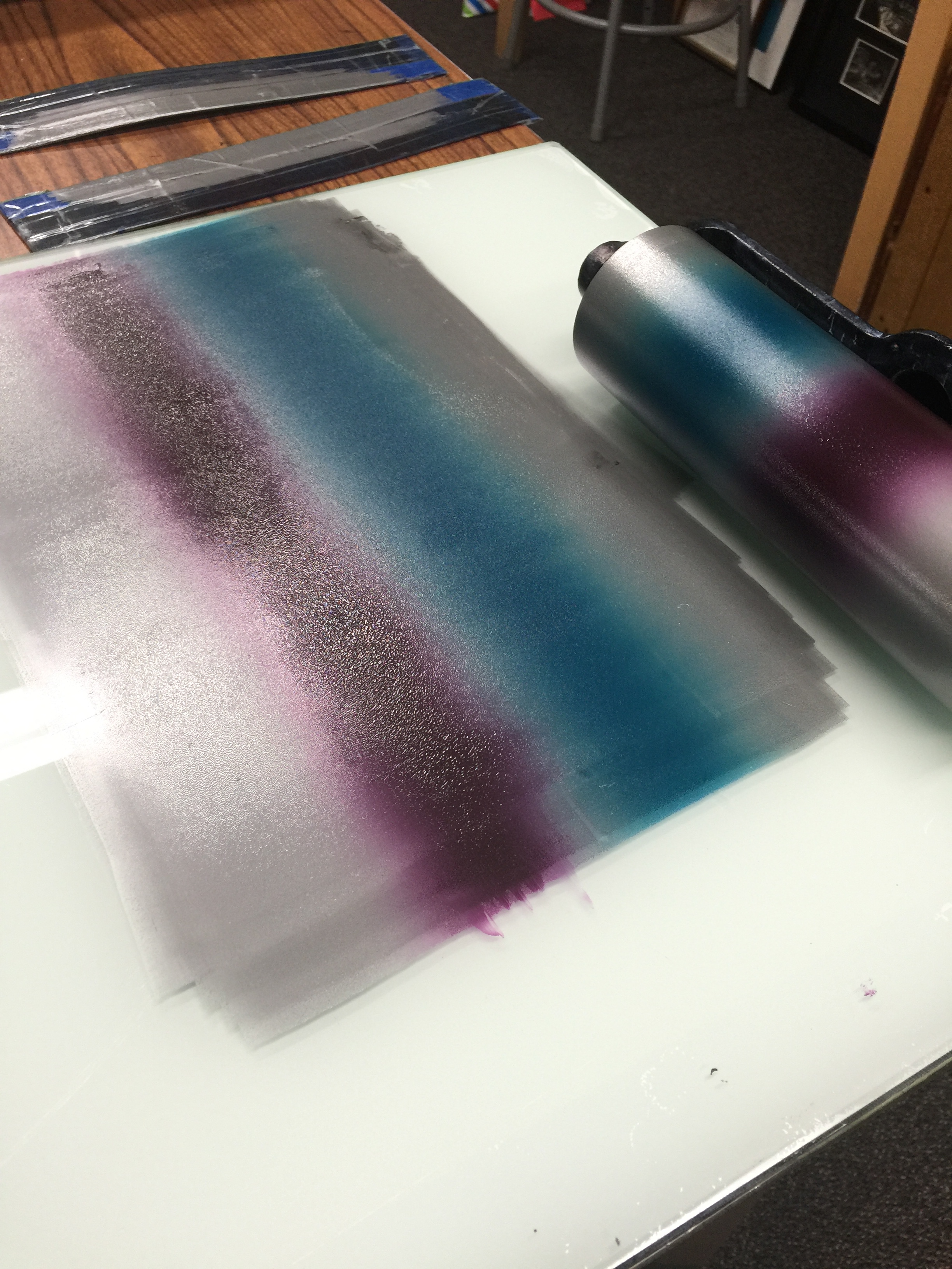 An ambitious split fountain, blending silver to blue to silver to purple to silver inks!
