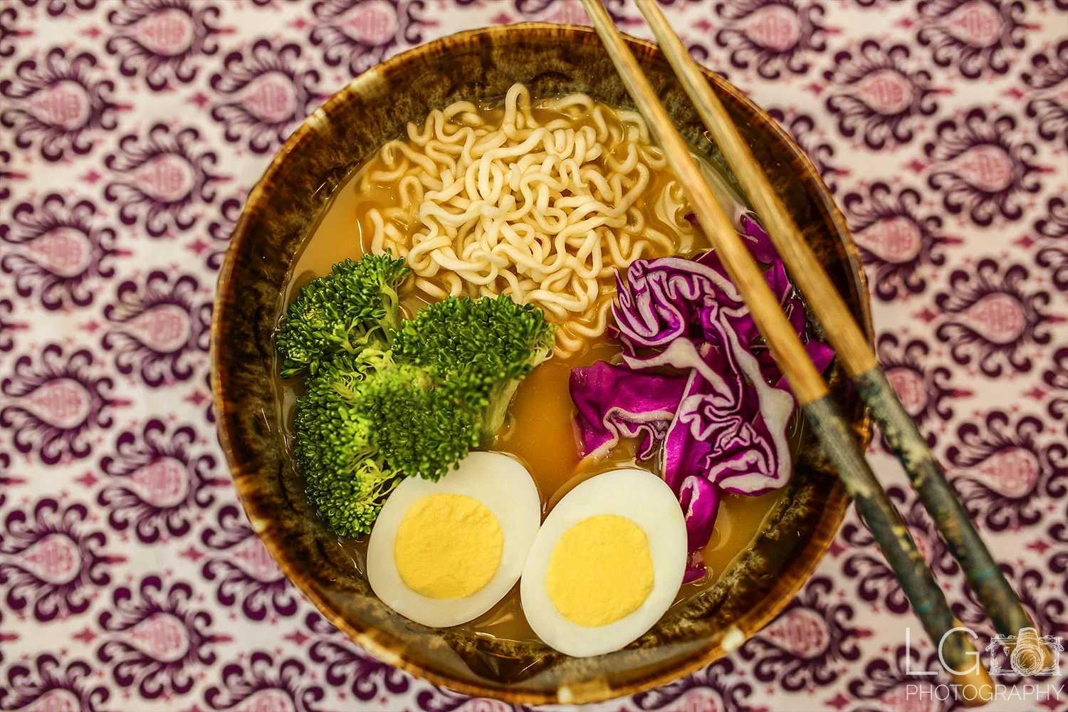 Ramen Bowl with Purple Cabbage, Broccoli, egg, and noodles
