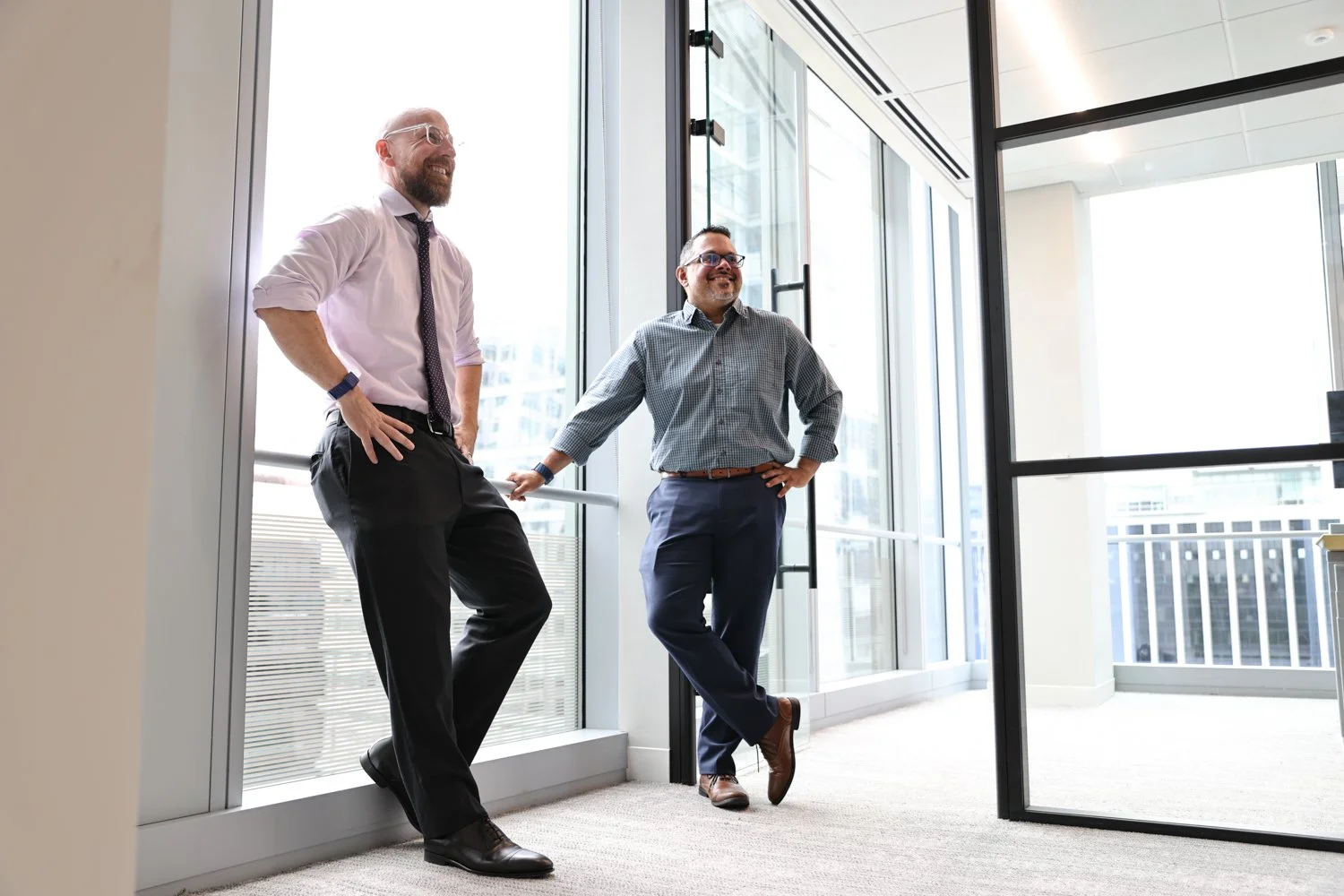 Corporate branding photography capturing authentic workplace interactions between Rocade Capital team members.