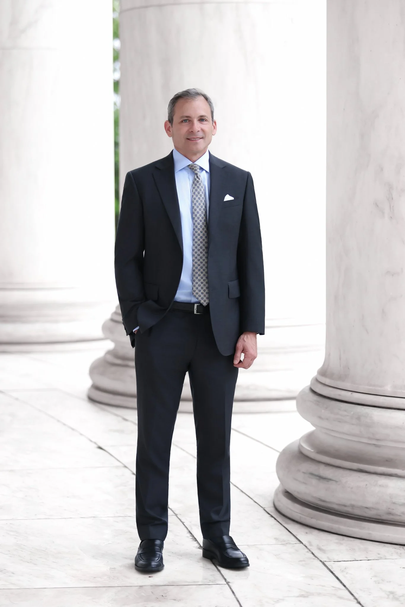 Environmental executive portrait of a Rocade Capital team member photographed outdoors in Washington, DC.