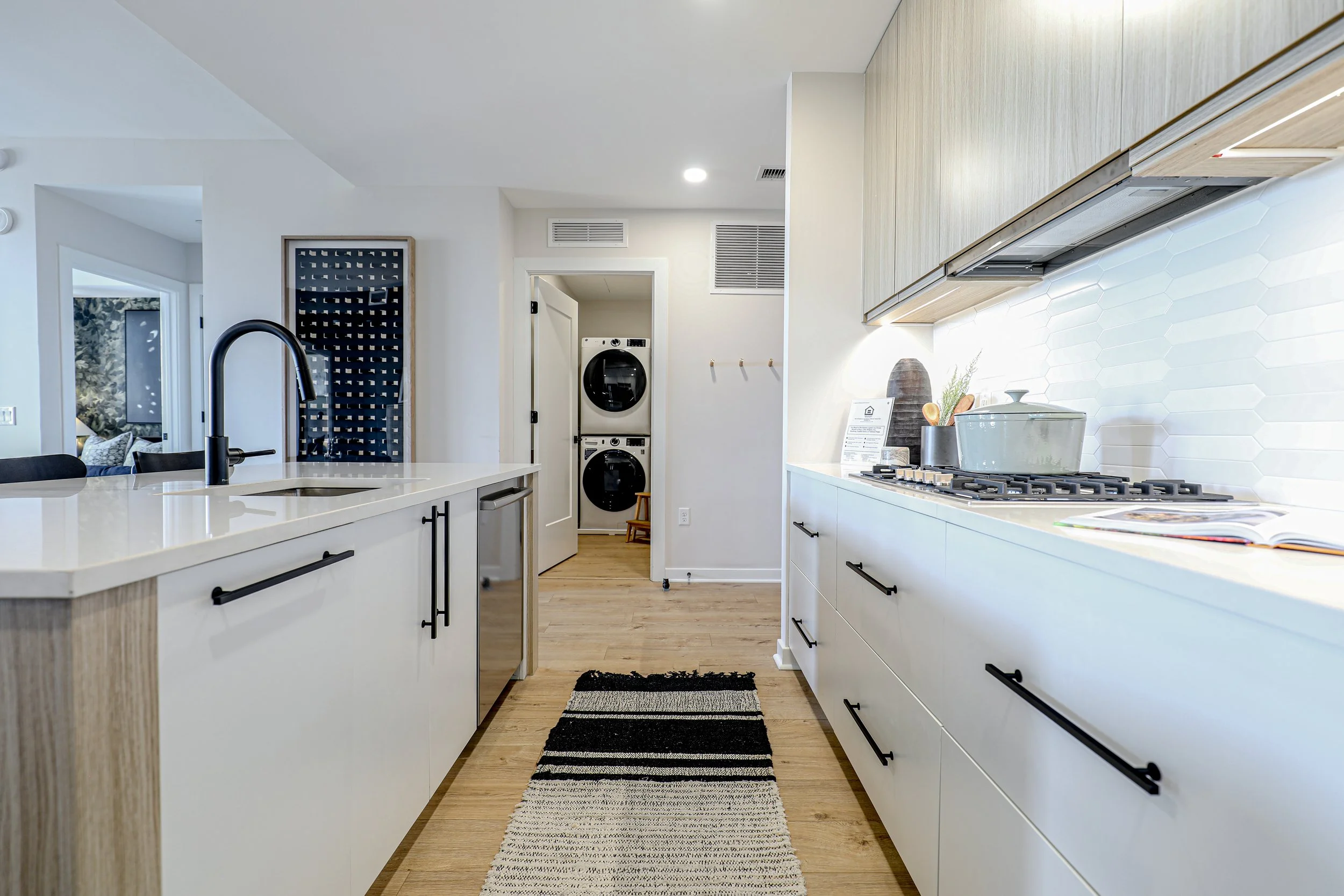 Residential interior photography highlighting a contemporary kitchen with premium finishes and natural light.