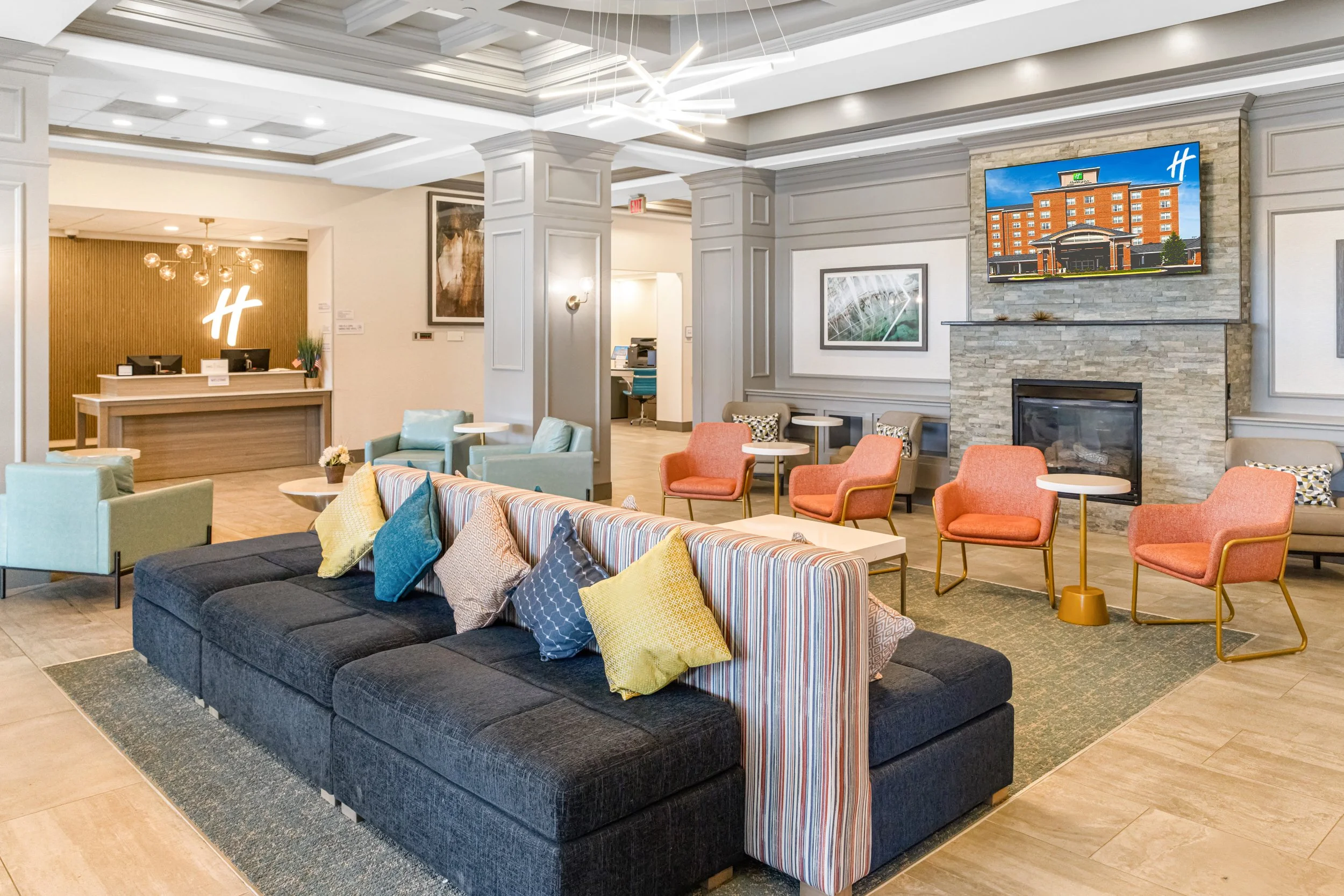 Renovated Holiday Inn hotel lobby photographed for hospitality marketing and branding.