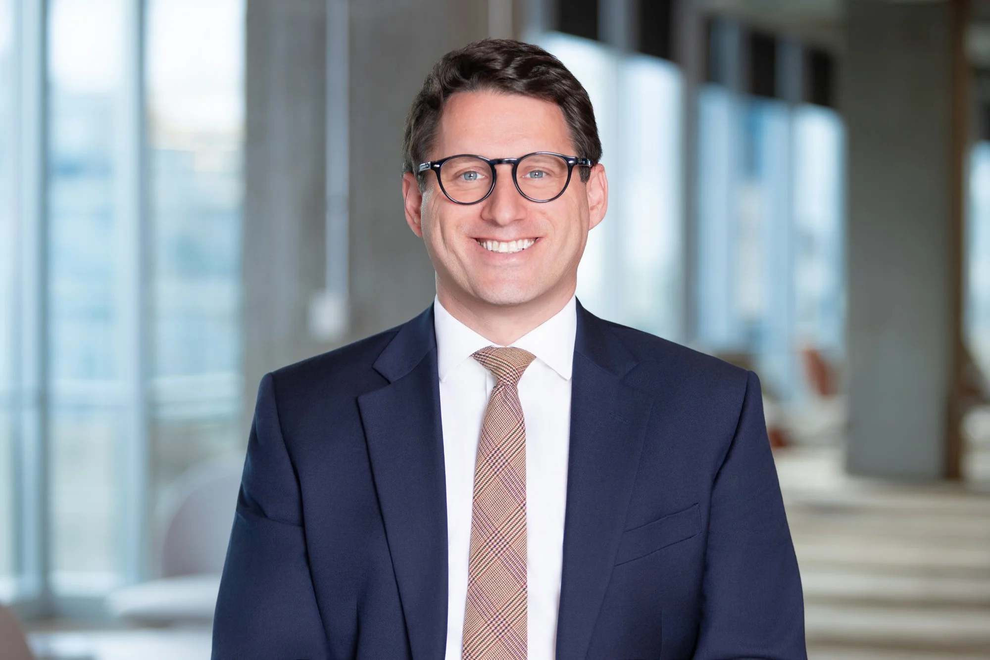 Environmental executive portrait photographed in a modern office