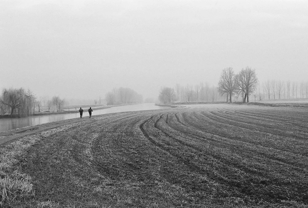 peaceful 2 joggers in park BW.jpg