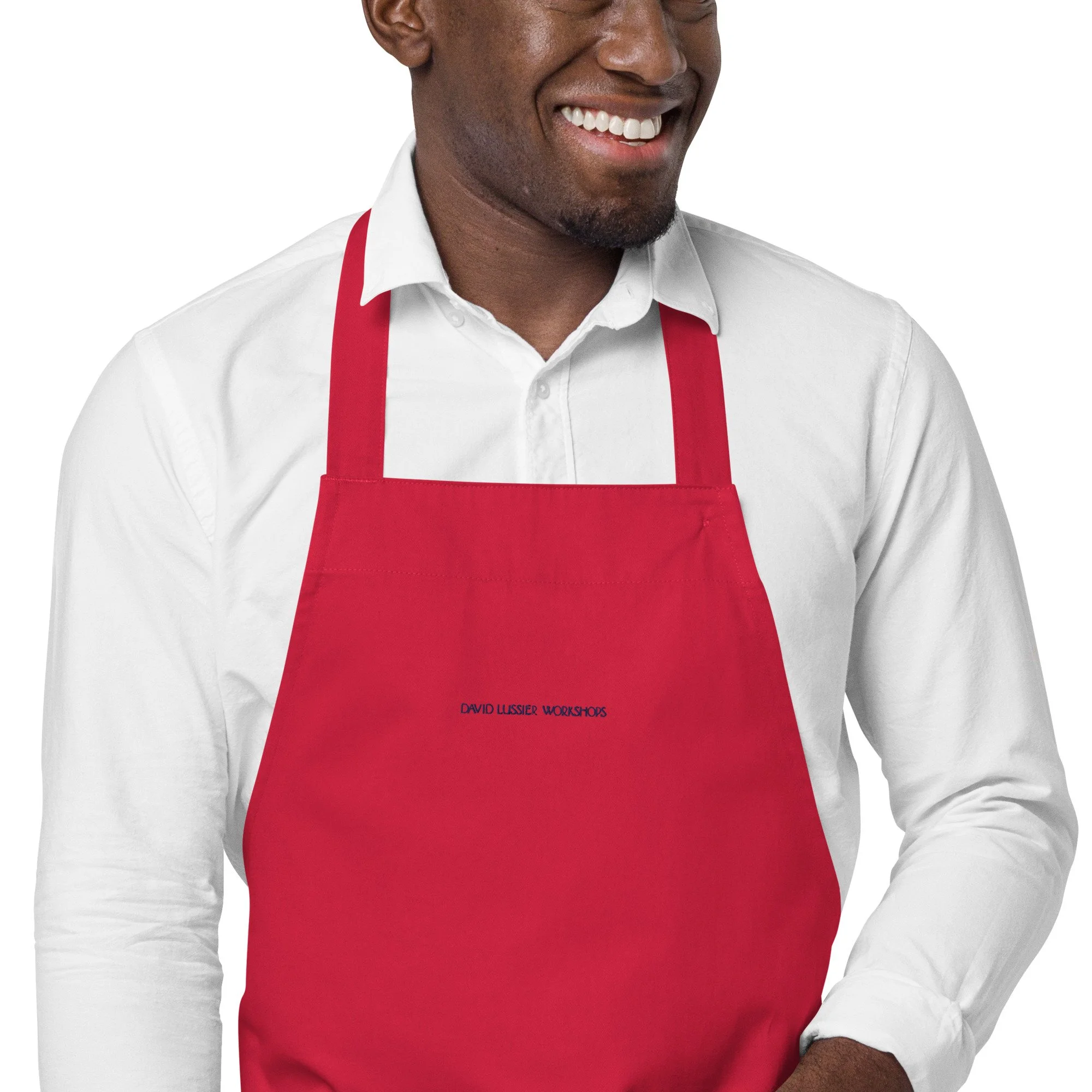 organic-cotton-apron-red-zoomed-in-63f931d590a09.jpg