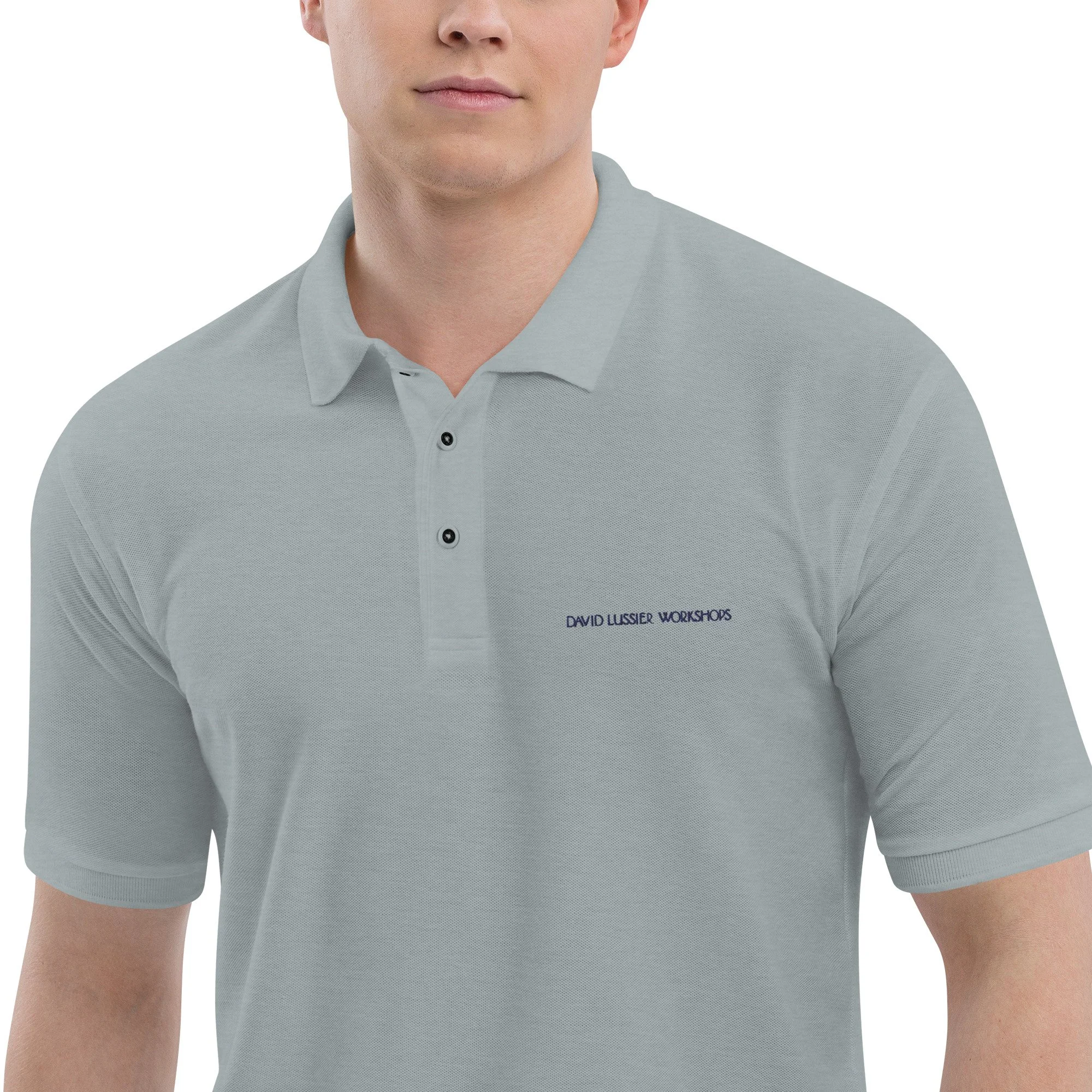 premium-polo-shirt-cool-heather-zoomed-in-63fa19db7f32d.jpg