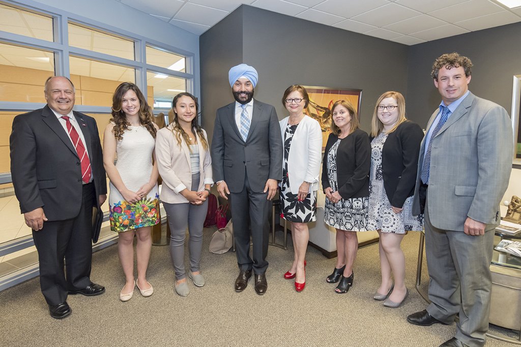 Ministers Bains and Foote with member of Memorial University’s Enactus team, recently crowned national champions.