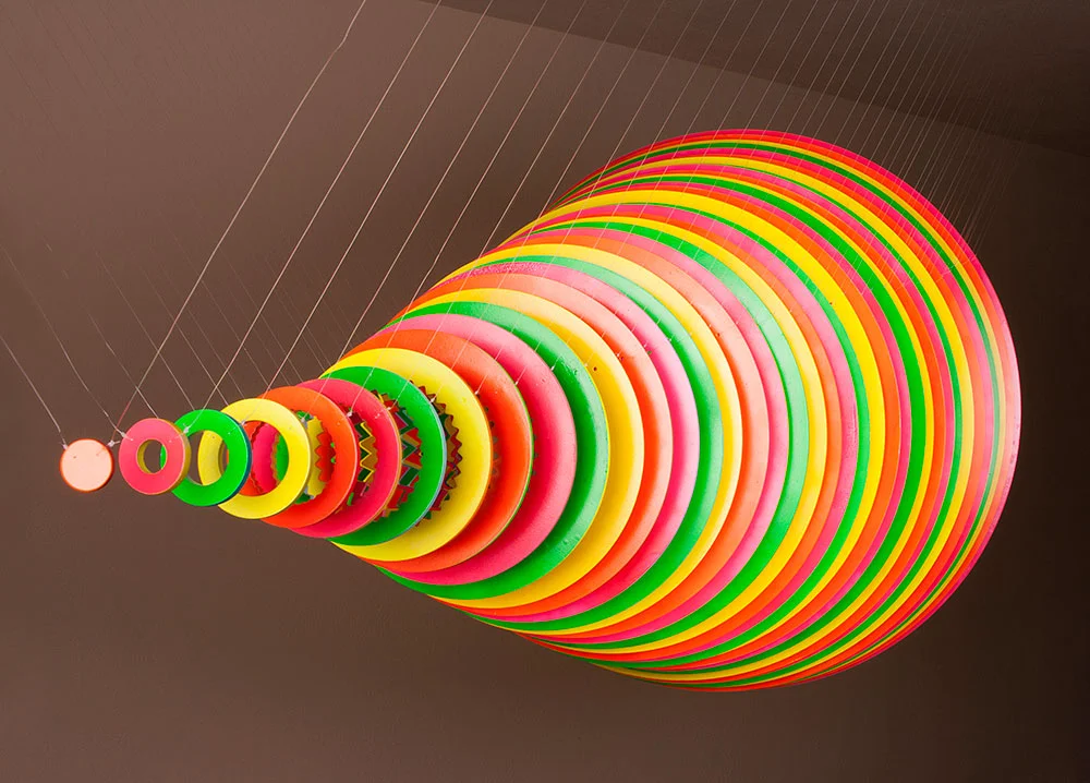  Full Circle (side view), 2014, latex spray paint on PVC, monofilament, 36 x 36 x 76 in. 