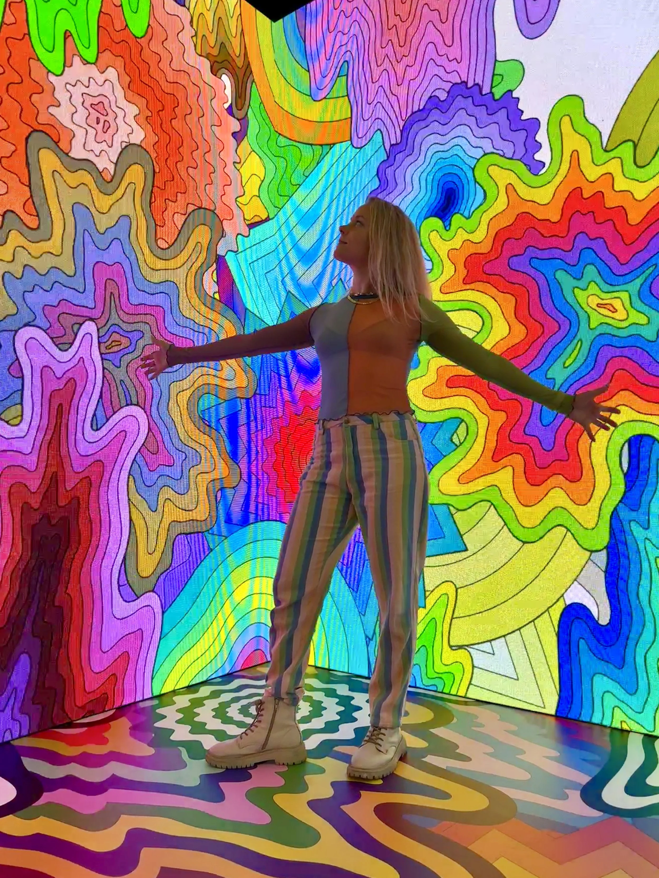   Waterfall Bloom  (installation at Adobe MAX Conference, Miami, FL), 2024, interactive animation (real-time generative projection), 10 × 40 ft 