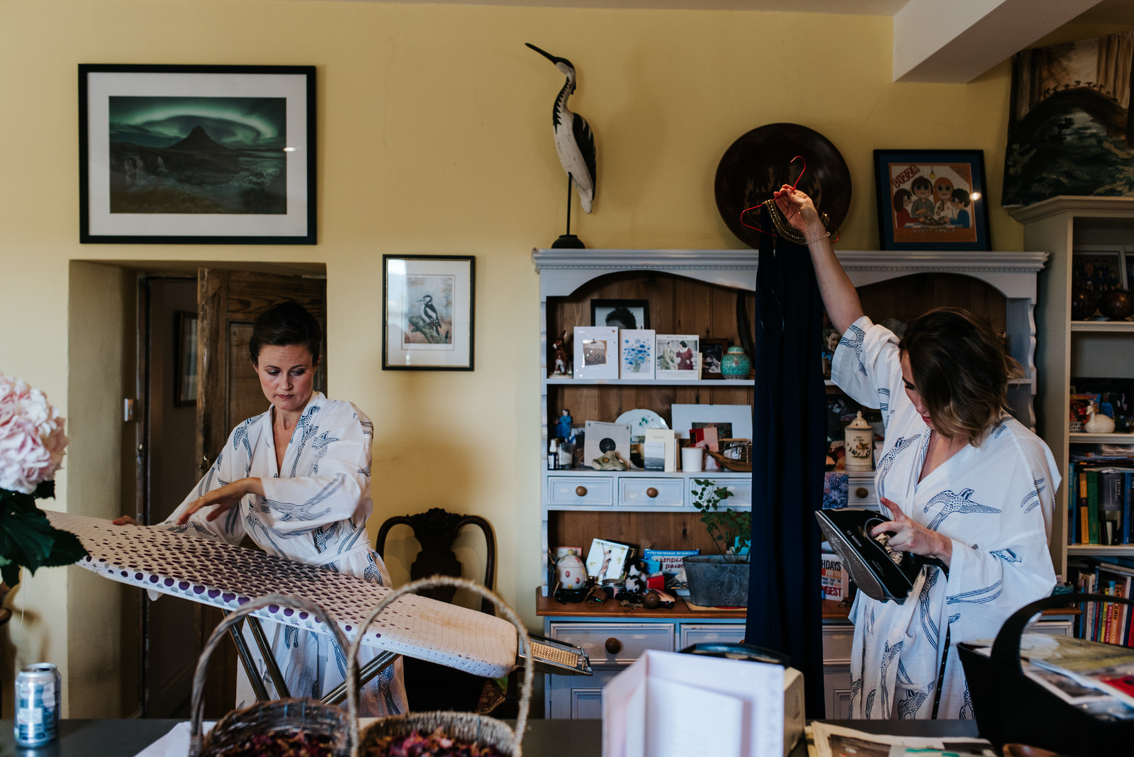 Bridesmaids iron clothes before wedding