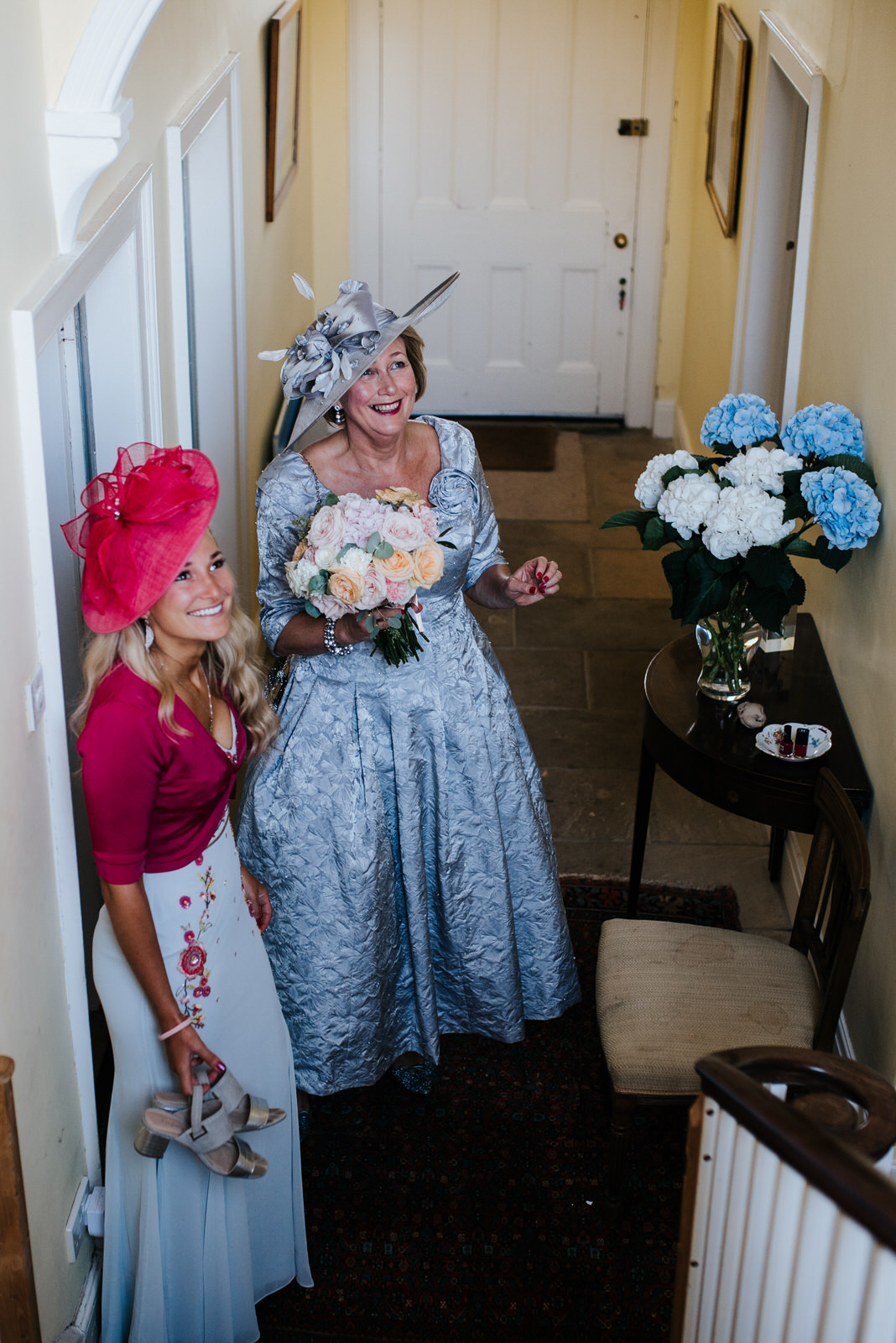 Mother of the bride overjoyed to see the bride in her dress