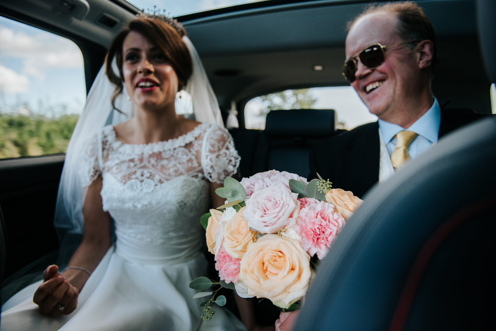 Bride and father of the bride nervous on their way to the Church