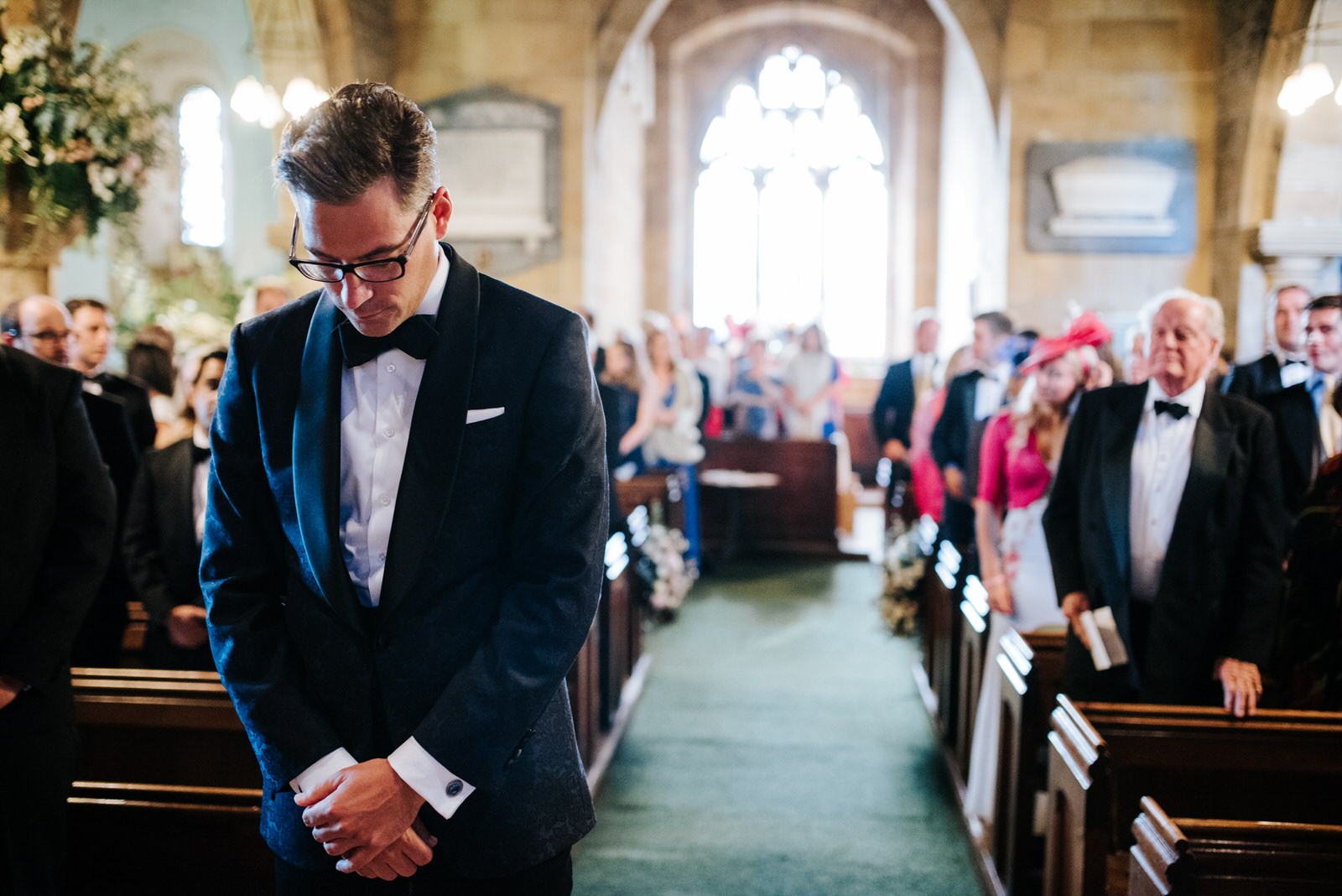 Groom waits at altar in Felixkirk Church