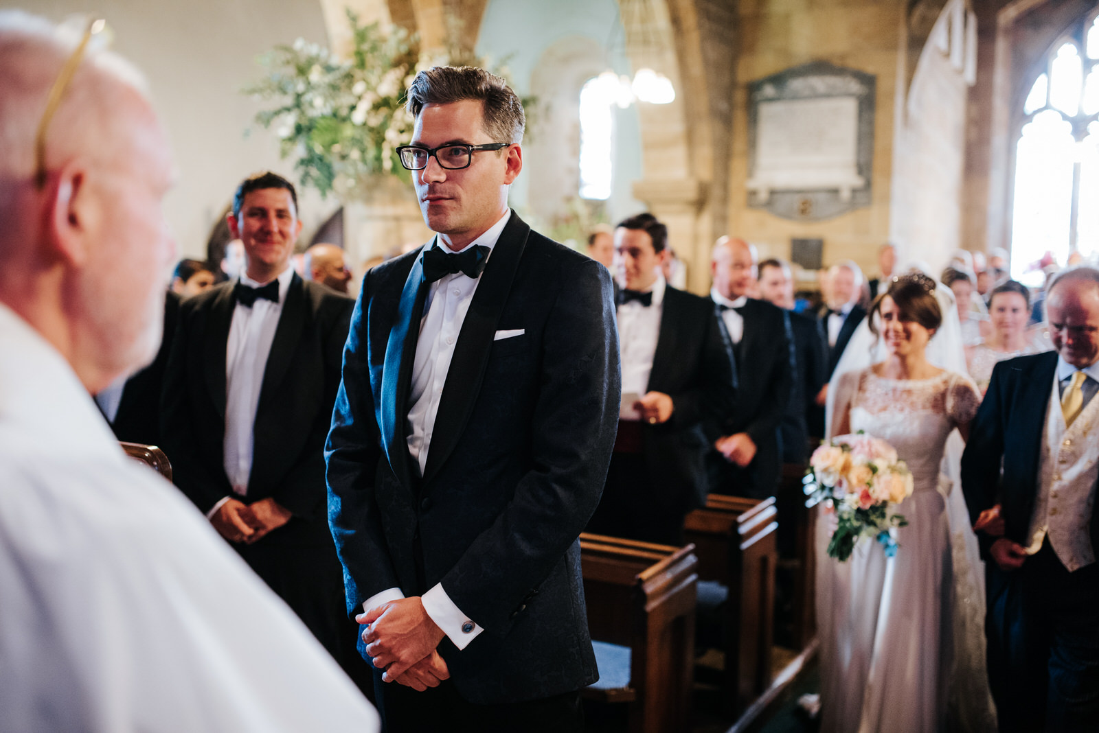 Groom nervously waits at the altar in Yorkshire as Bride inches 