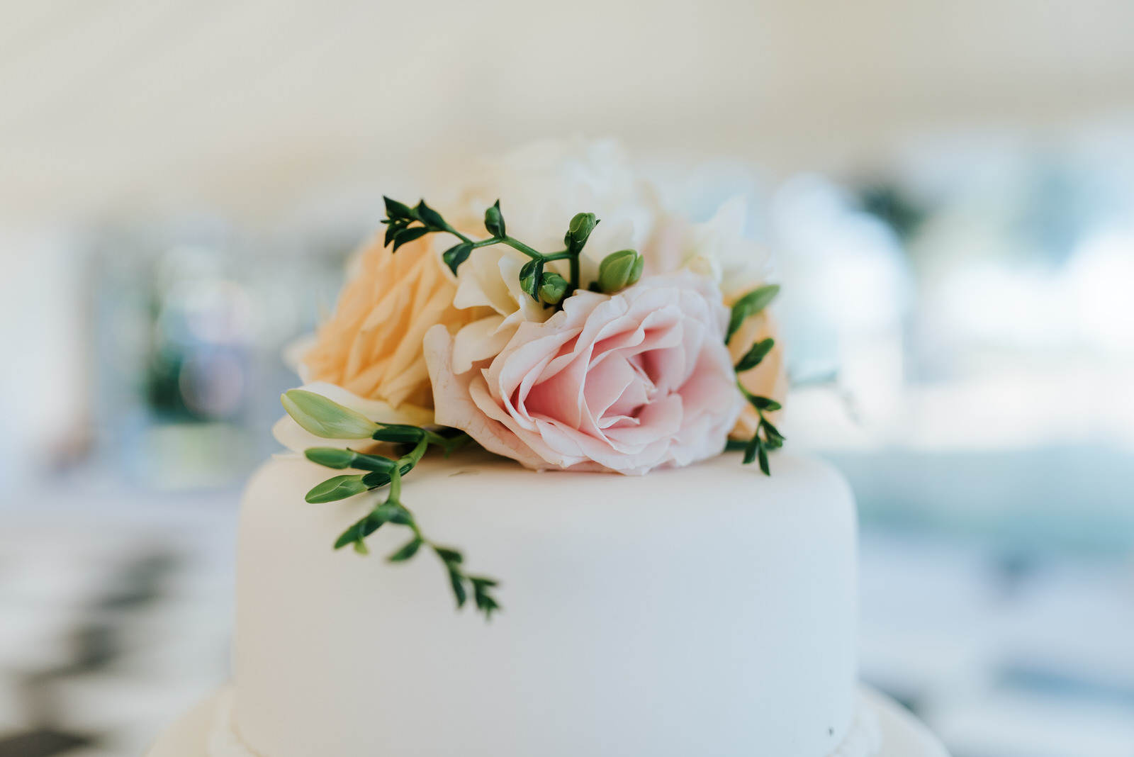 Close-up of wedding cake topper designed by Twinkling Twine