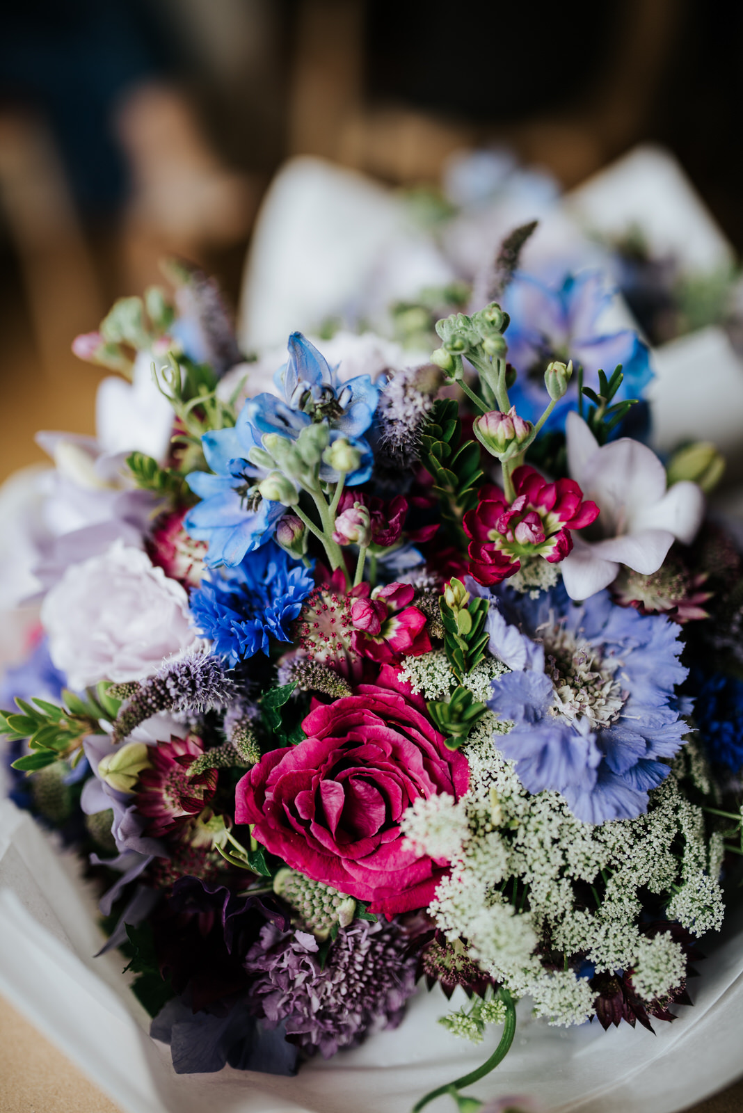 Close-up of the bridal bouquet with stunning red rose
