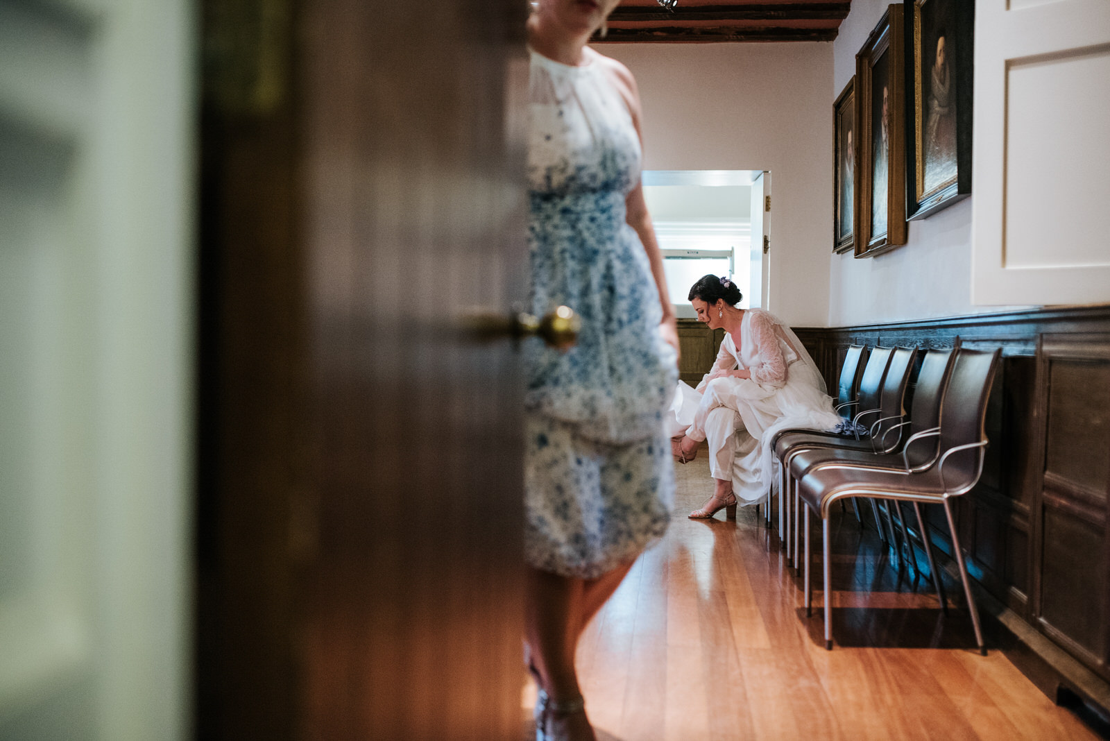 Bride dries her feet in room next to Jesus College Chapel