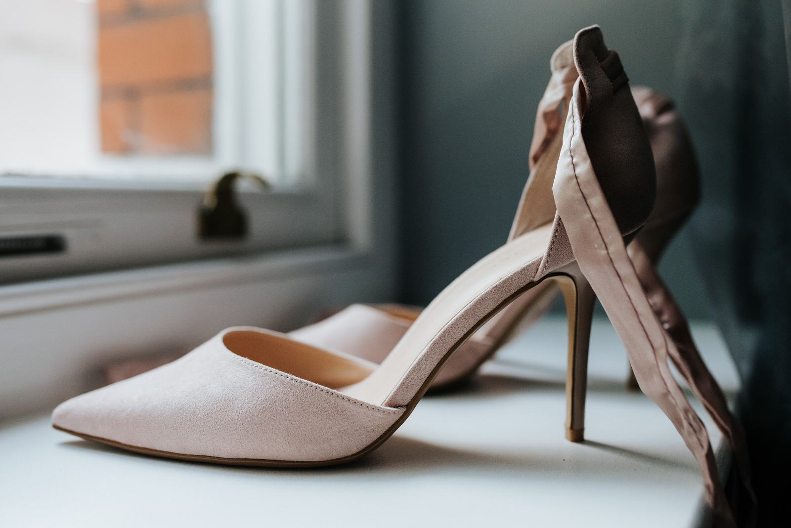 Baby pink bridal shoes detail shot