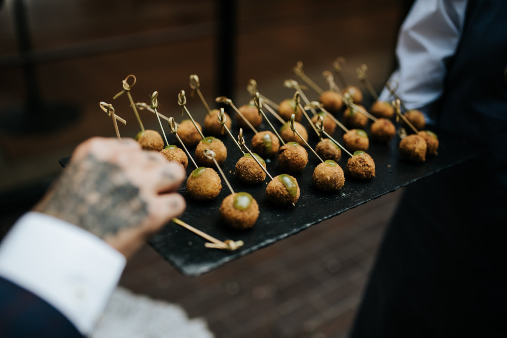 Close up of canapes while guest takes one