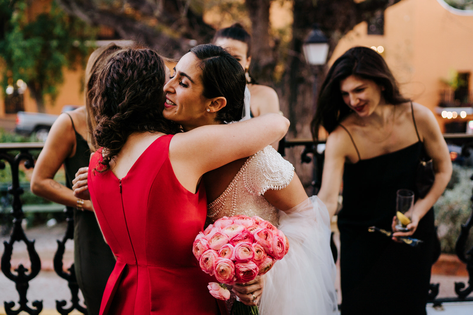 Bride hugs a friend in Old San Juan