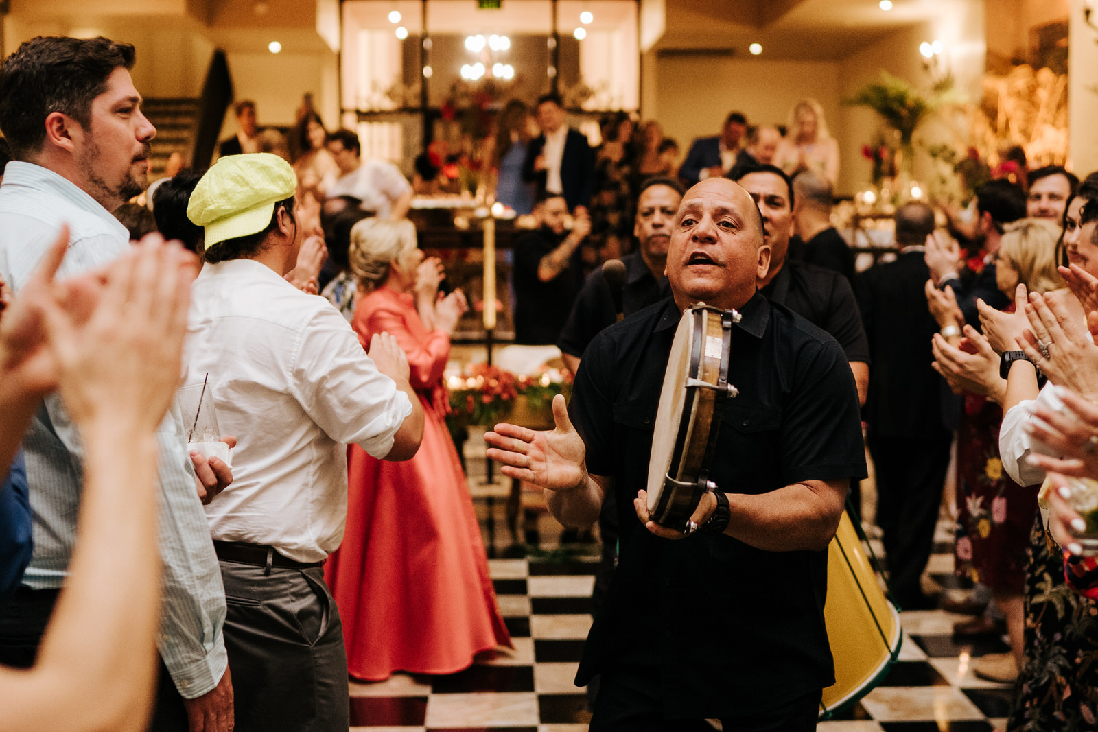 Pleneros arrive at the wedding playing Puerto Rican instruments