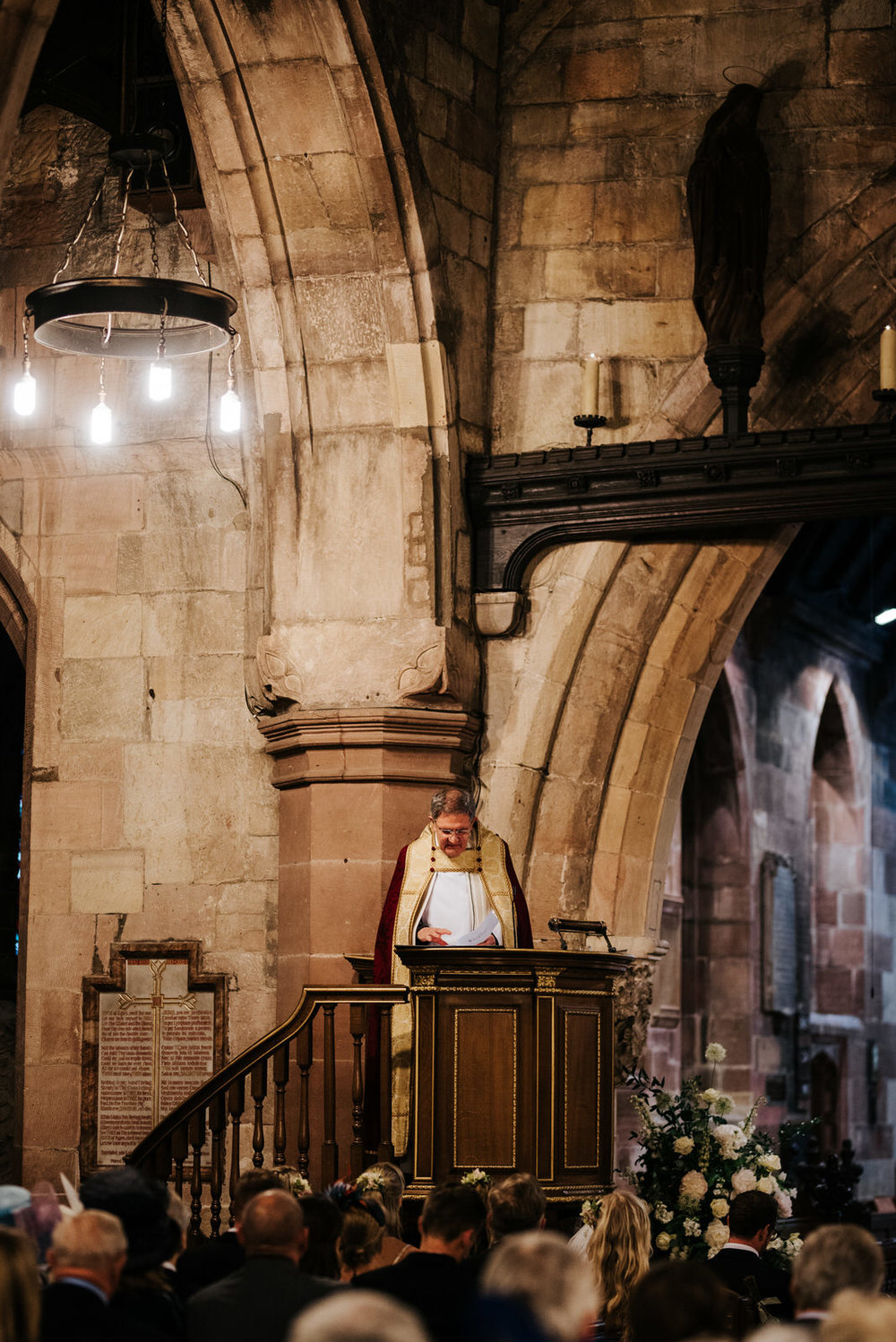  Vicar reads sermon during wedding ceremony in Hawarden 
