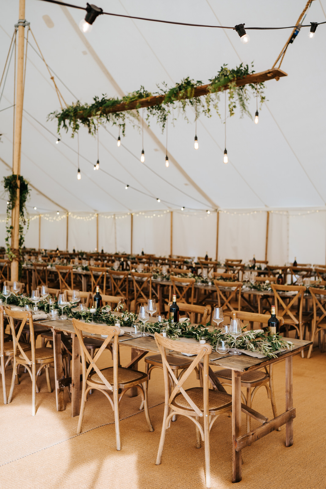  Rustic and charming table setup and decoration inside marquee in the garden of Hawarden Castle 