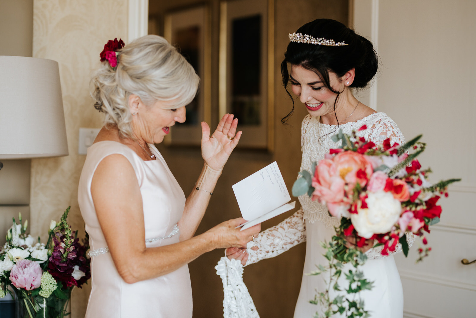  Mother of the bride reads emotional letter that bride wrote for her and tries to keep herself from crying 