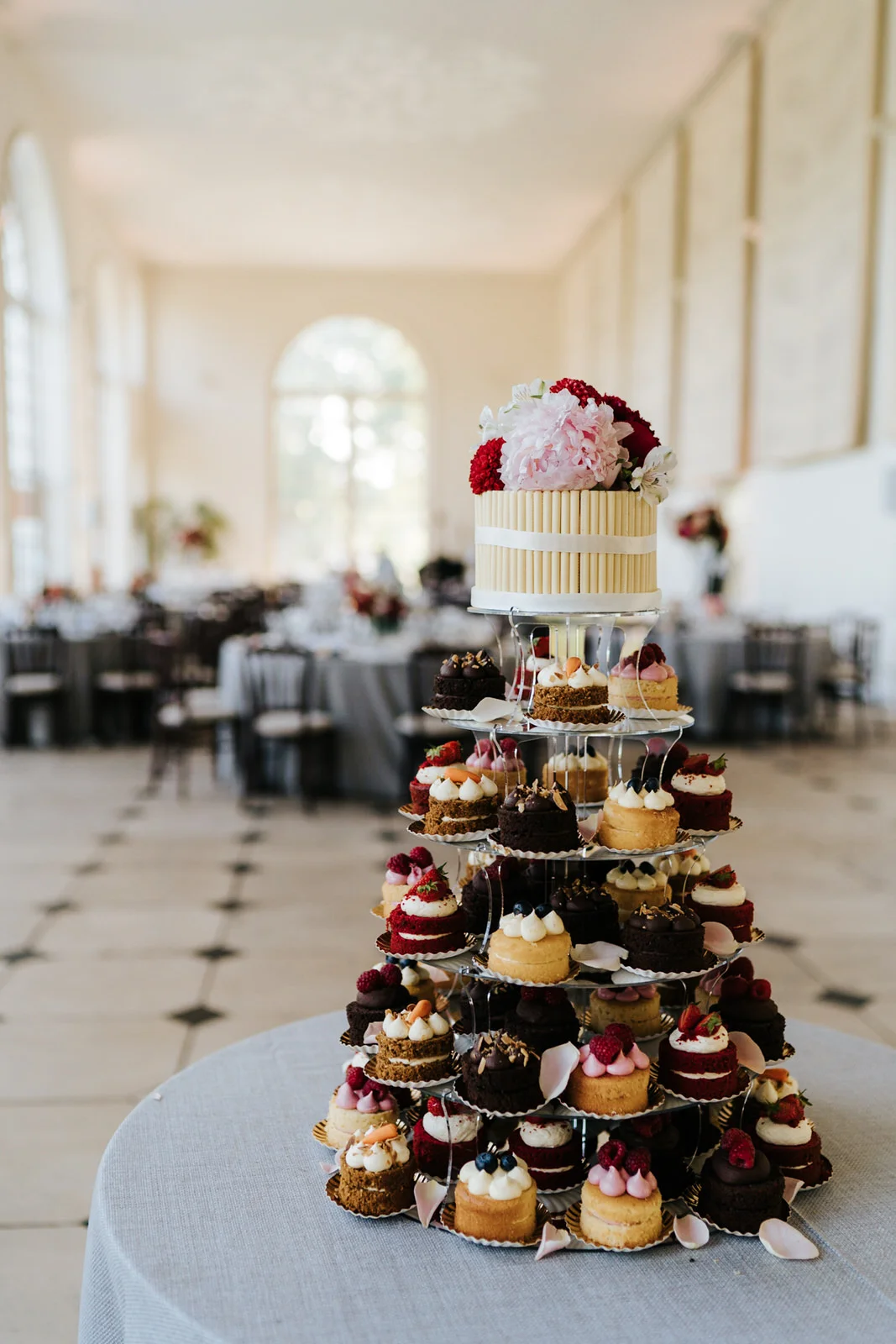 Photograph of wedding cake which is actually made up of many smaller cakes